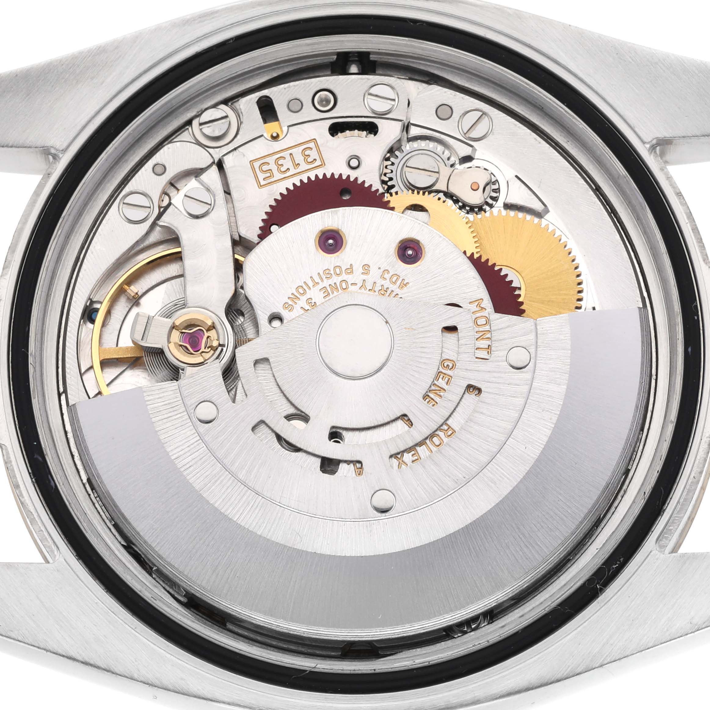 The image shows the movement mechanism of a Rolex Datejust 116233 Men
s Steel and Gold (two tone) Champagne Dial 116233 Men
s Steel and Gold (two tone) Champagne Dial watch, viewed from the back.