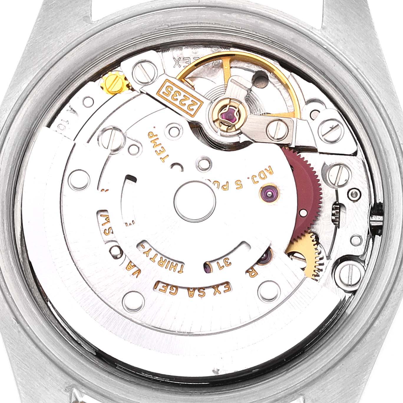 This is a close-up view of the movement mechanism inside a Rolex Datejust 79173 Women's Steel and Gold (two tone) Silver Dial 79173 Women's Steel and Gold (two tone) Silver Dial watch, showing intricate gears and components.