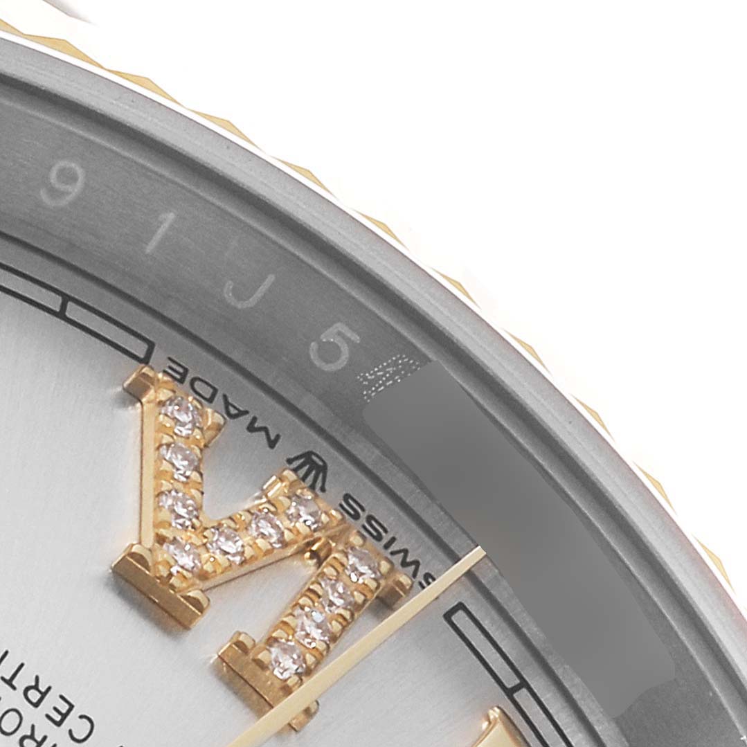 The image shows a close-up of the Rolex Datejust 126233 Men's Steel and Gold (two tone) Silver Dial 126233 Men's Steel and Gold (two tone) Silver Dial dial, revealing part of the bezel, the "Swiss Made" text, and a jeweled Roman numeral marker.
