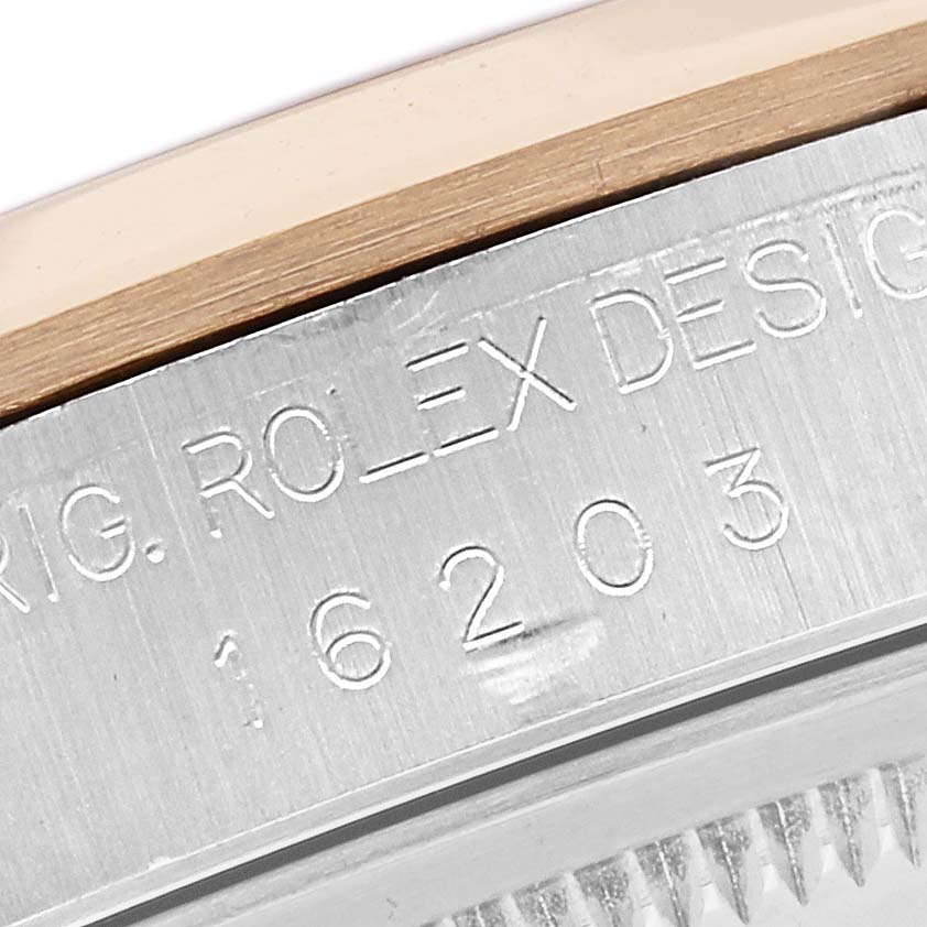 The image shows a close-up of the side, featuring the model number engraving on the Rolex Datejust 16203 Men's Steel and Gold (two tone) Grey Dial 16203 Men's Steel and Gold (two tone) Grey Dial watch case.