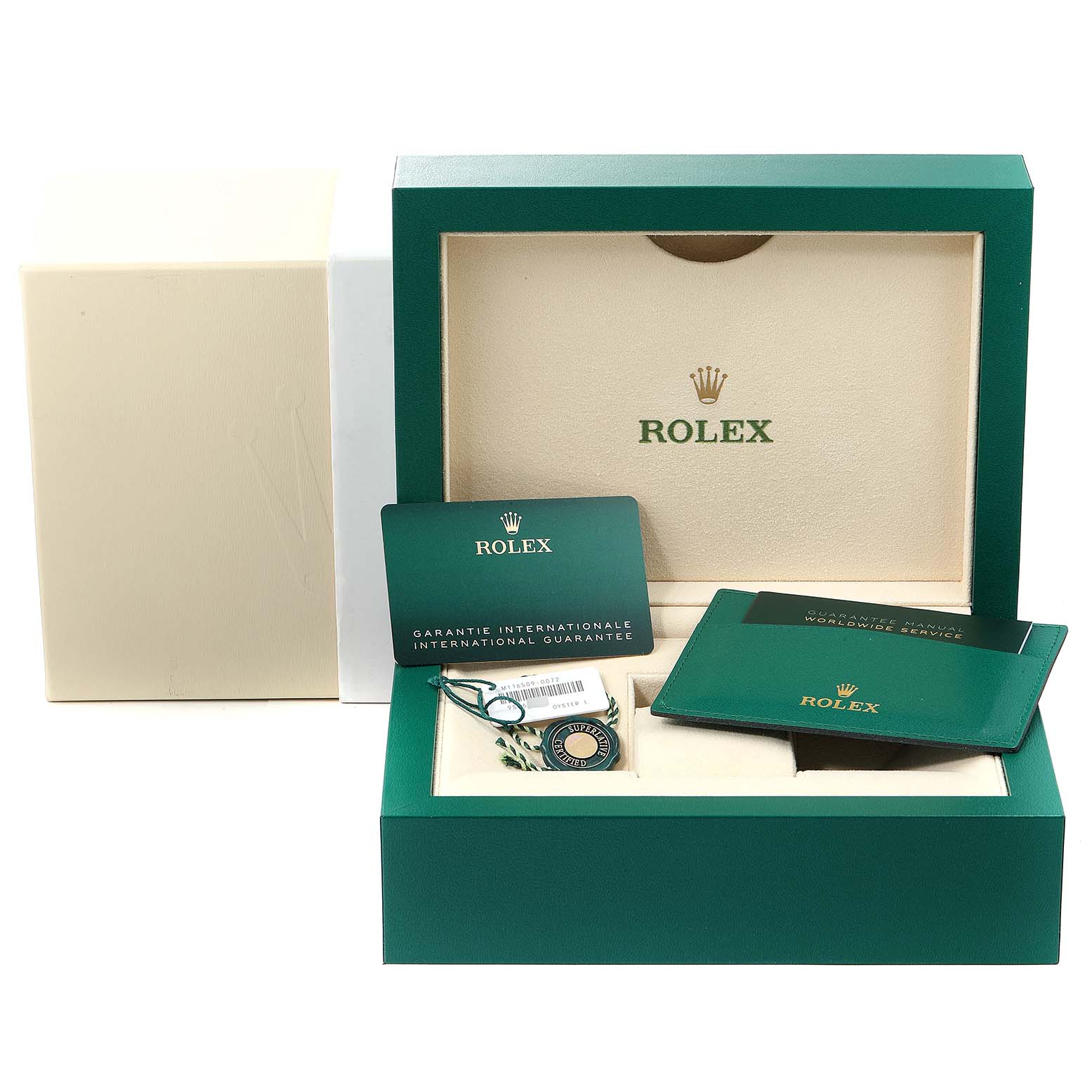 The image shows the packaging and accessories for a Rolex Daytona 116509 Men's White Gold Silver Dial 116509 Men's White Gold Silver Dial watch, including a green box, guarantee card, and manuals.