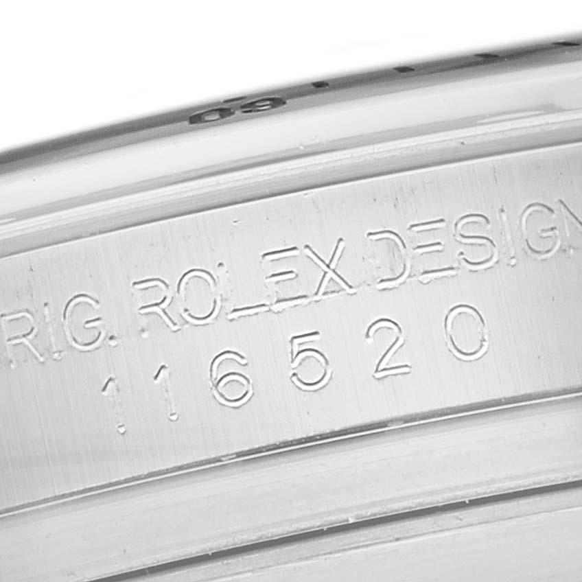 This is a close-up shot of the Rolex Daytona 116520 Men's Stainless Steel Black Dial 116520 Men's Stainless Steel Black Dial model 116520 case engraving.