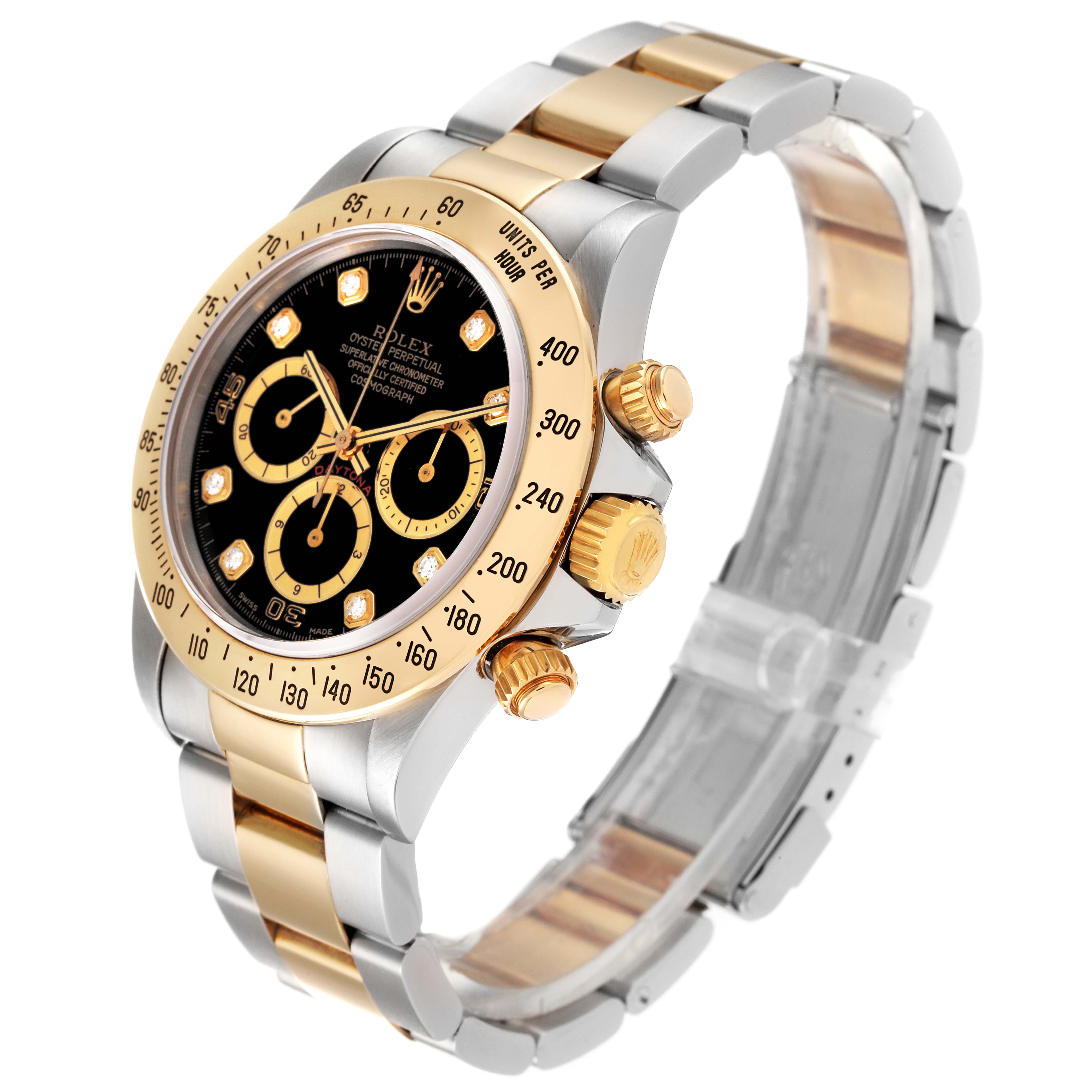 The Rolex Daytona 16523 Men's Steel and Gold (two tone) Black Dial 16523 Men's Steel and Gold (two tone) Black Dial watch is shown at a three-quarter angle, displaying its dial, bezel, crown, and bracelet.