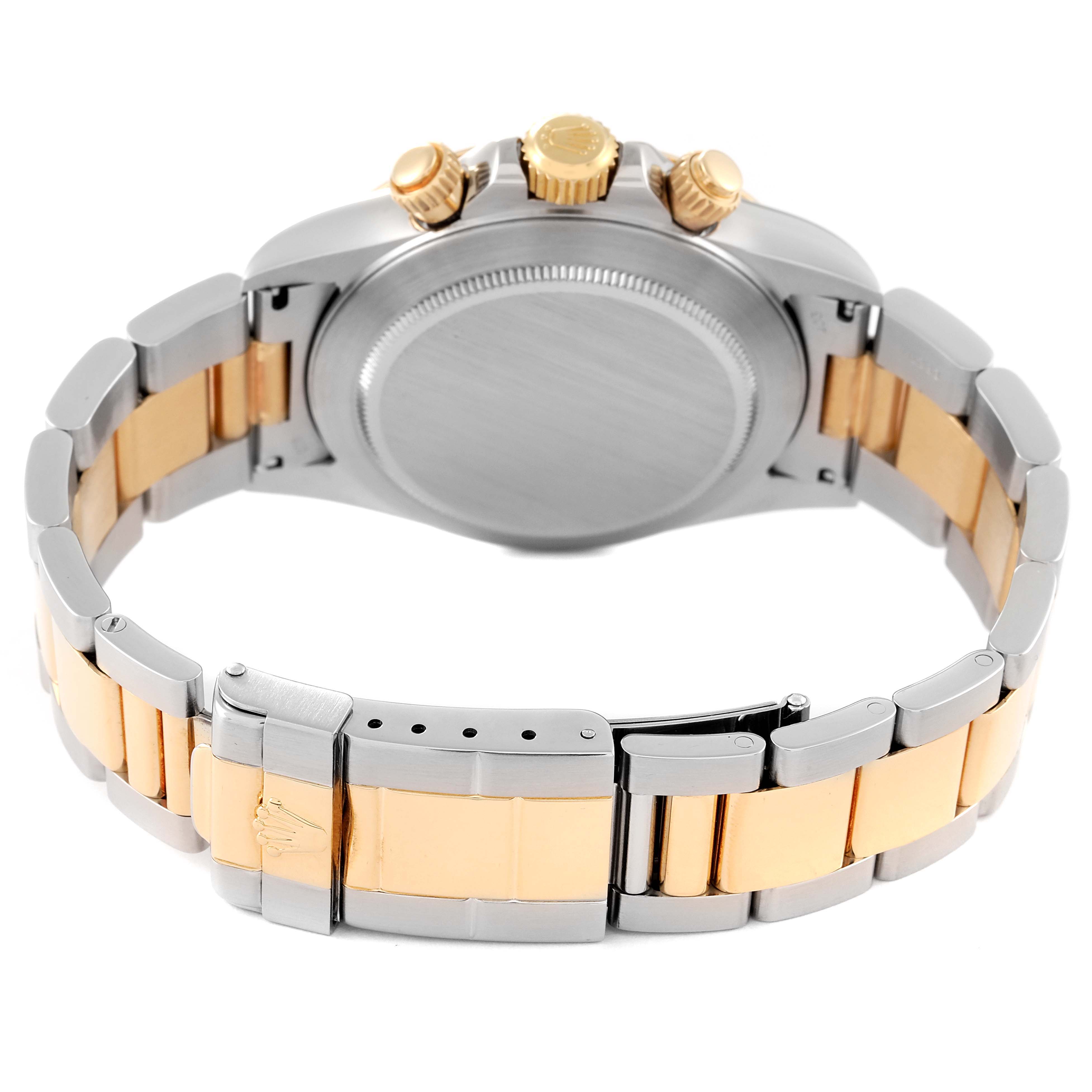 The image shows the back view of a Rolex Daytona 16523 Men's Steel and Gold (two tone) Black Dial 16523 Men's Steel and Gold (two tone) Black Dial watch, including the bracelet and the case back.