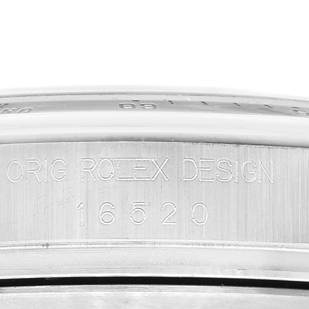 This image shows a close-up of the caseback and model number inscription of a Rolex Daytona 16520 Men
s Stainless Steel White Dial 16520 Men
s Stainless Steel White Dial watch.