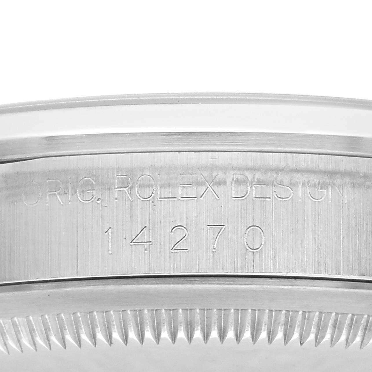 The image shows the side of a Rolex Explorer 14270 Men
s Stainless Steel Black Dial 14270 Men
s Stainless Steel Black Dial watch case, displaying the engraved model number 14270 and "ORIG ROLEX DESIGN."