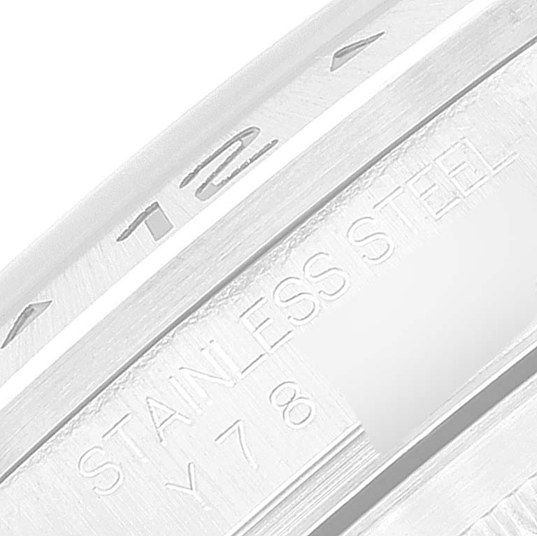 Close-up angle of the stainless steel bezel and engraved serial number of the Rolex Explorer 16570 Men
s Stainless Steel Black Dial 16570 Men
s Stainless Steel Black Dial watch.