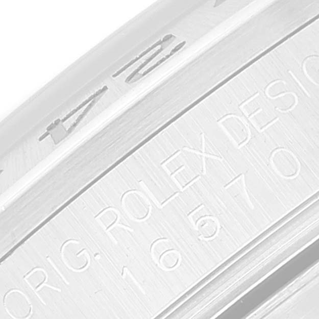 This close-up angle shows the engraved serial number and part of the bezel on a Rolex Explorer 16570 Men
s Stainless Steel Black Dial 16570 Men
s Stainless Steel Black Dial watch.