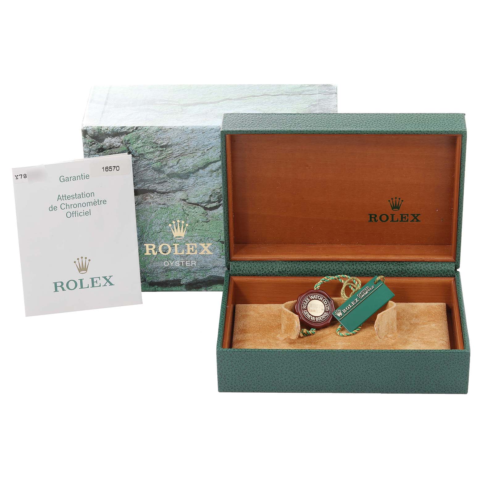 The image shows a Rolex Explorer 16570 Men
s Stainless Steel Black Dial 16570 Men
s Stainless Steel Black Dial watch box, warranty card, and tags, positioned from a slightly elevated front angle.