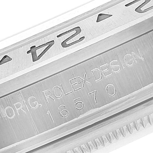 This image shows a close-up of the bezel and the casing of a Rolex Explorer 16570 Men
s Stainless Steel Black Dial 16570 Men
s Stainless Steel Black Dial watch, model number 16570.