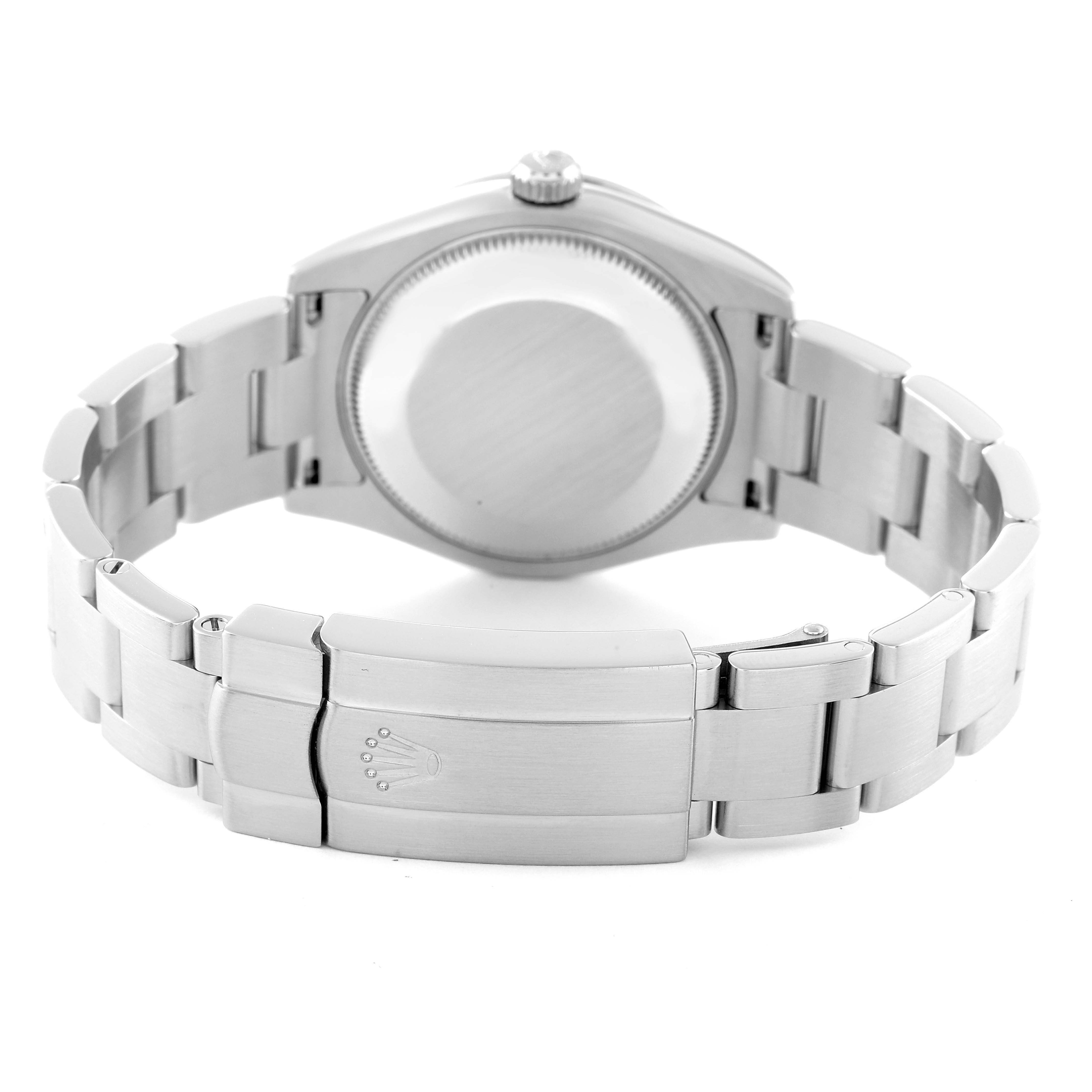 The image shows the back view of a Mid-Size Rolex watch, focusing on the case back and part of the bracelet with the clasp.