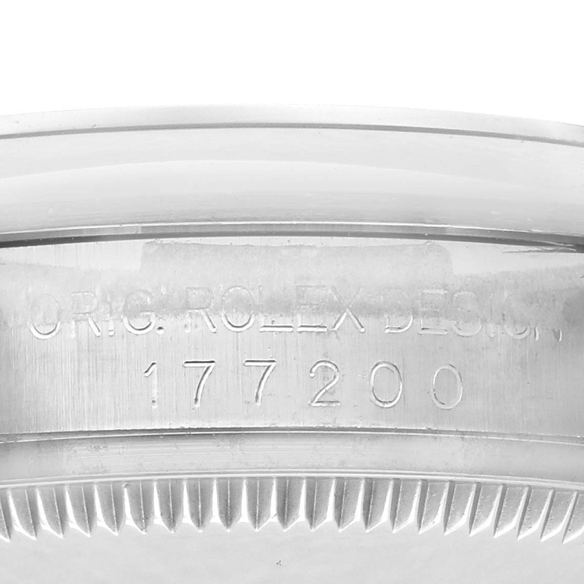 The image shows the side view of a Rolex watch, displaying the model number "177200" and part of the bezel design.