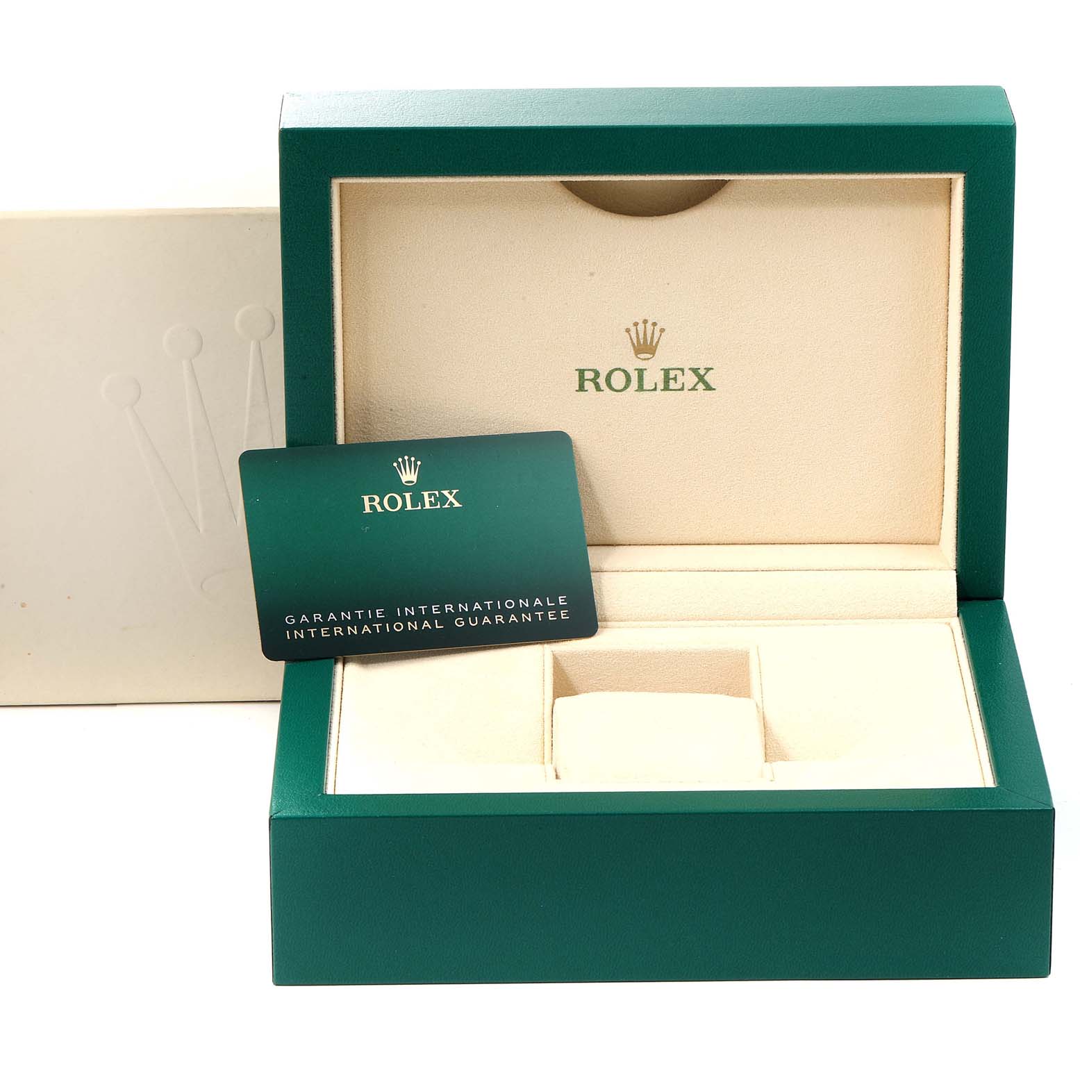 The image shows the open case and international guarantee card for a Rolex Oyster Perpetual 126000 Men
s Stainless Steel Blue Dial 126000 Men
s Stainless Steel Blue Dial watch.