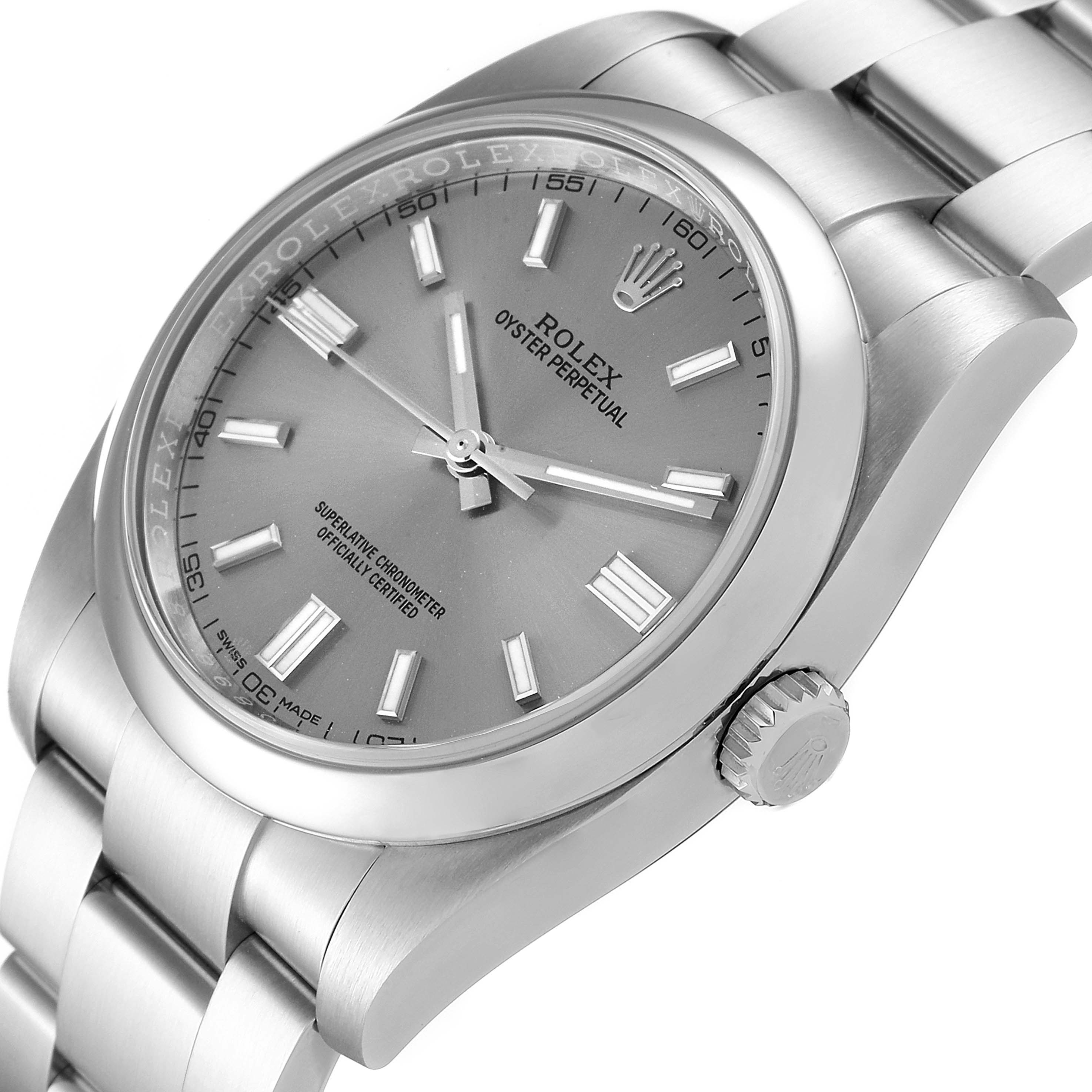 The Rolex Oyster Perpetual 116000 Men's Stainless Steel Grey Dial 116000 Men's Stainless Steel Grey Dial watch is shown at a slight angle highlighting the face, crown, and part of the bracelet.