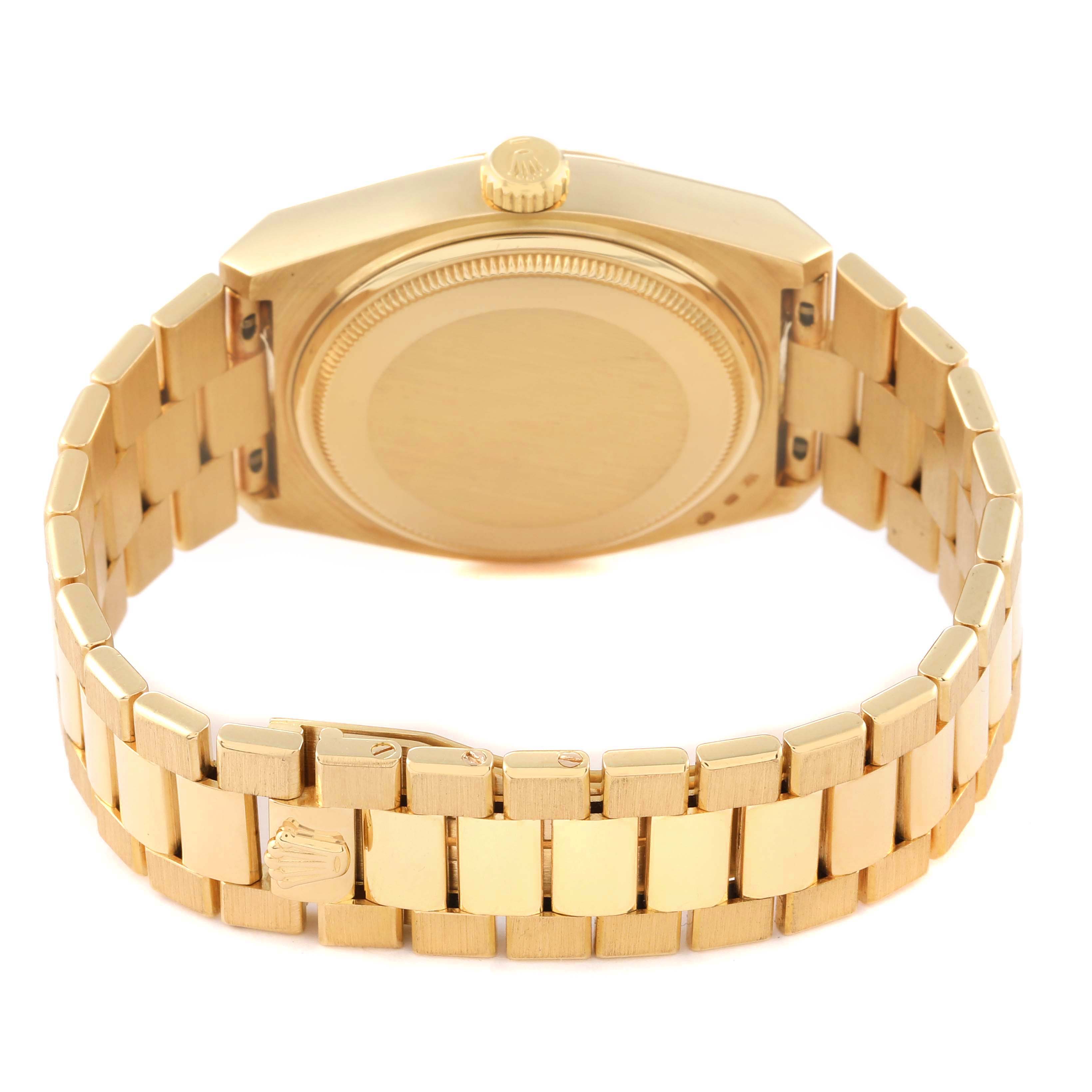 This image shows the back case and bracelet of a gold Rolex Oysterquartz 19018 Men
s Yellow Gold Champagne Dial 19018 Men
s Yellow Gold Champagne Dial watch from a rear angle.