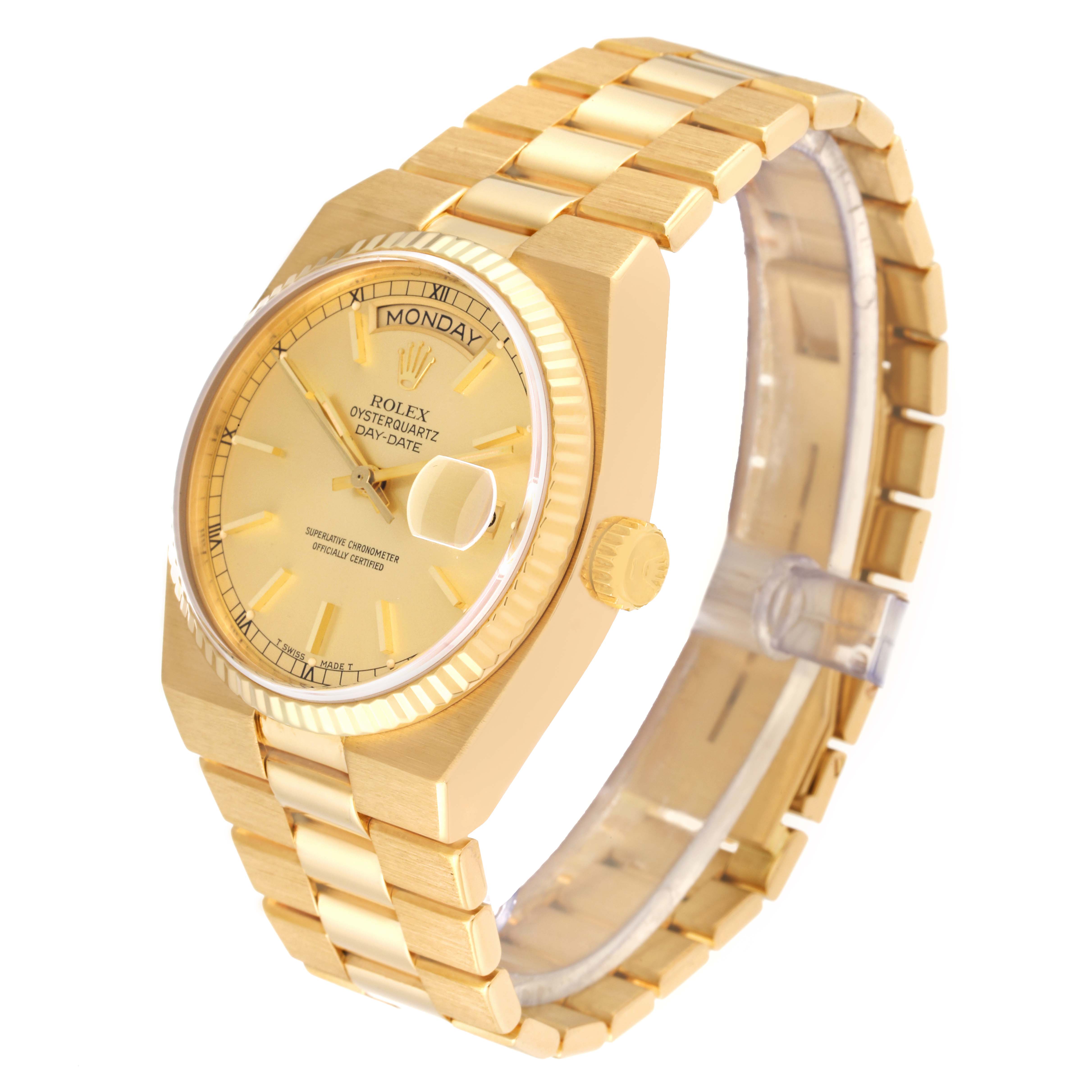 The image shows a Rolex Oysterquartz 19018 Men
s Yellow Gold Champagne Dial 19018 Men
s Yellow Gold Champagne Dial Day-Date watch at a three-quarter angle, highlighting its gold bracelet and dial.