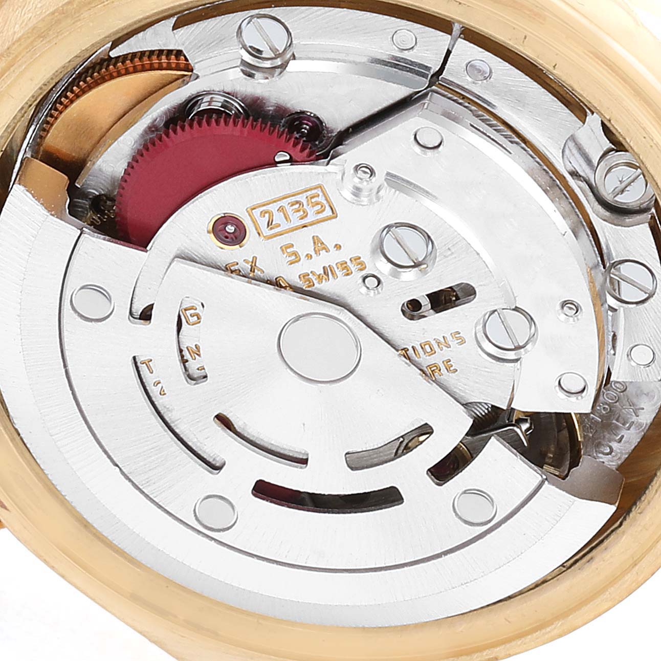The image displays the internal mechanism of a Rolex President 69178 Women
s Yellow Gold Champagne Dial 69178 Women
s Yellow Gold Champagne Dial model watch, showcasing parts of its movement.