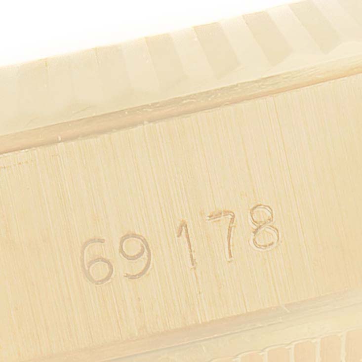 This image shows a close-up angle of the model number engraving on a Rolex President 69178 Women
s Yellow Gold Champagne Dial 69178 Women
s Yellow Gold Champagne Dial watch.