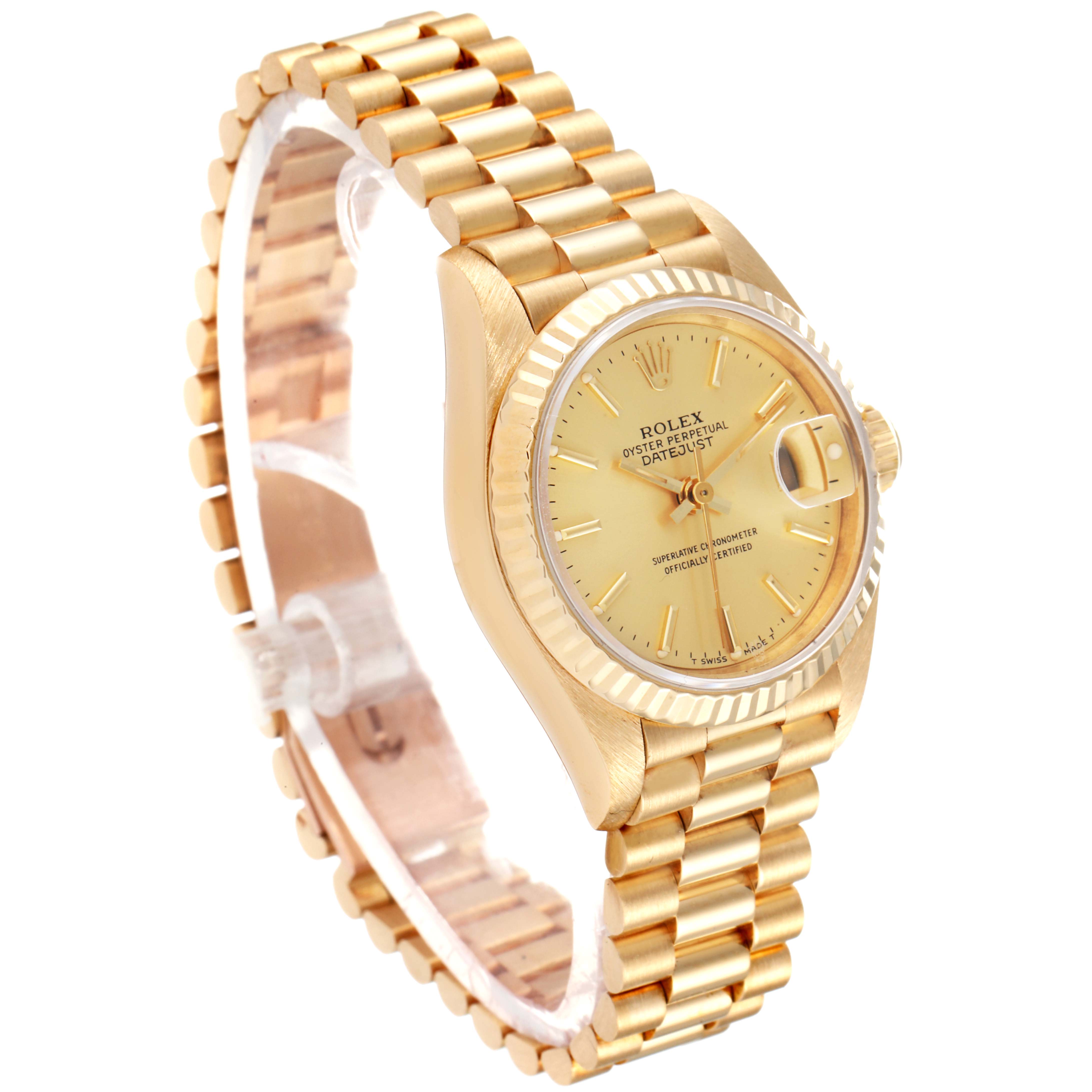 The President model Rolex watch is shown at an angle highlighting its gold case, fluted bezel, and linked bracelet.