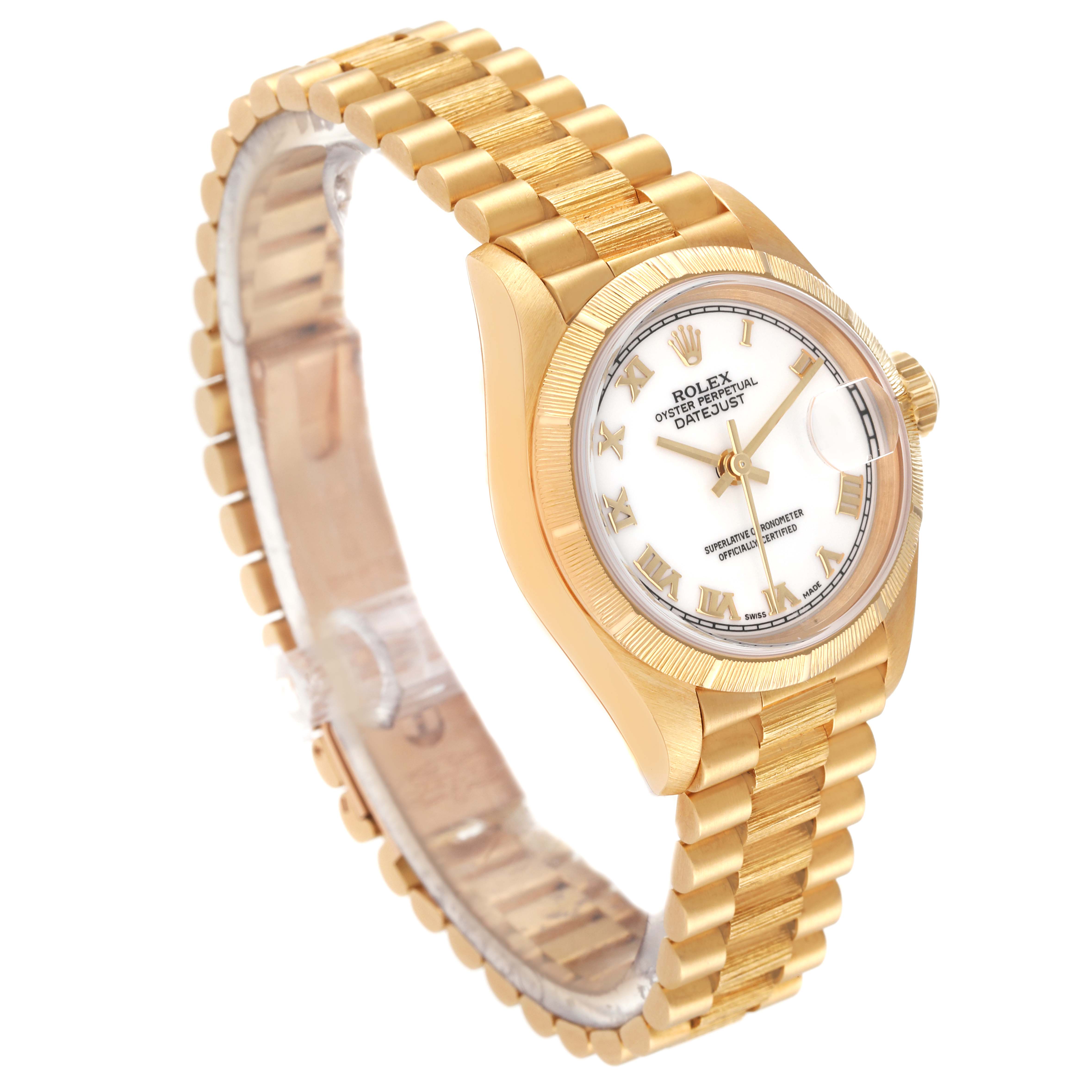 The image shows a Rolex President 69278 Women
s Yellow Gold White Dial 69278 Women
s Yellow Gold White Dial model watch angled to display its gold case, bracelet, dial, and crown.