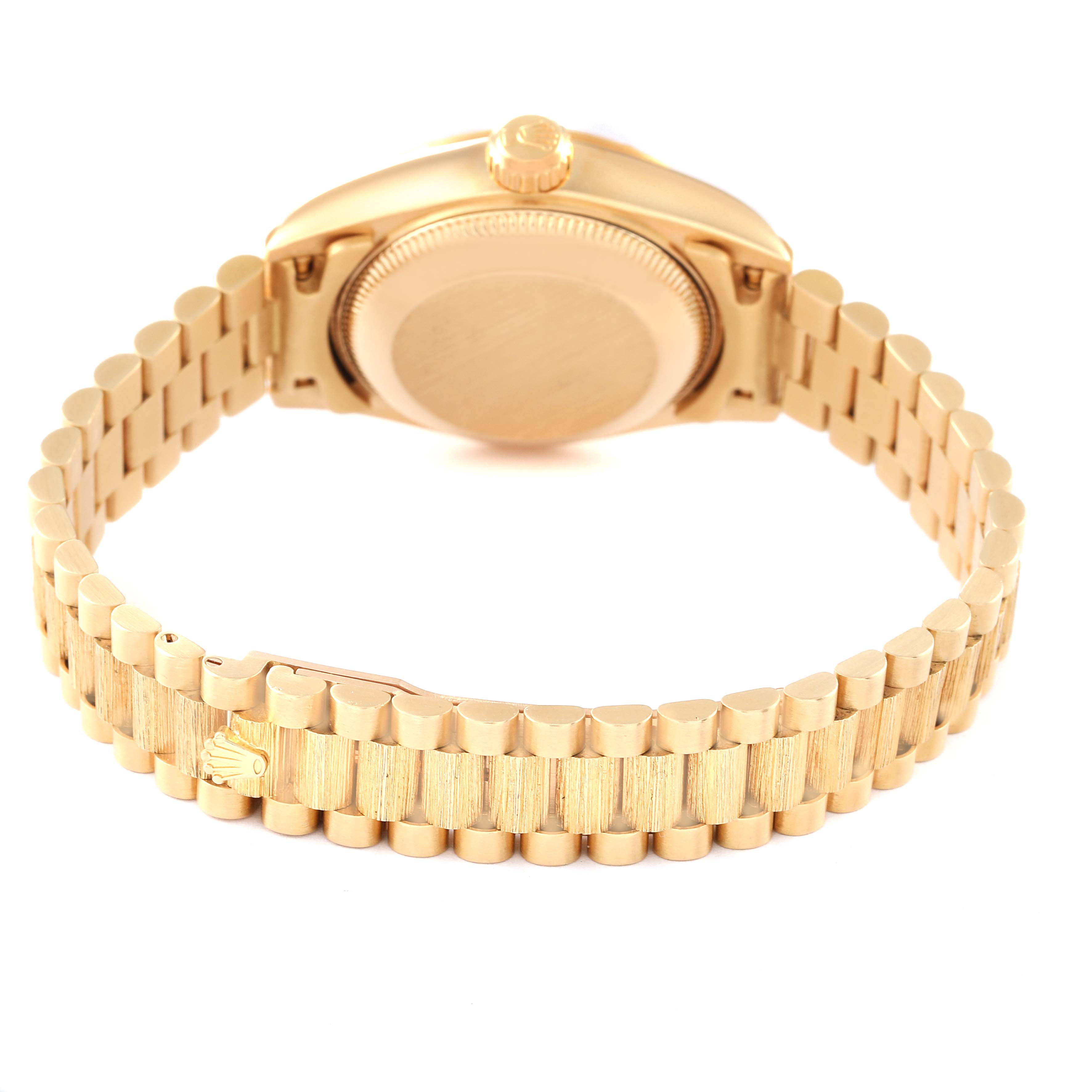 This image shows the back case and the bracelet of a Rolex President 69278 Women
s Yellow Gold White Dial 69278 Women
s Yellow Gold White Dial model watch from a rear angle.