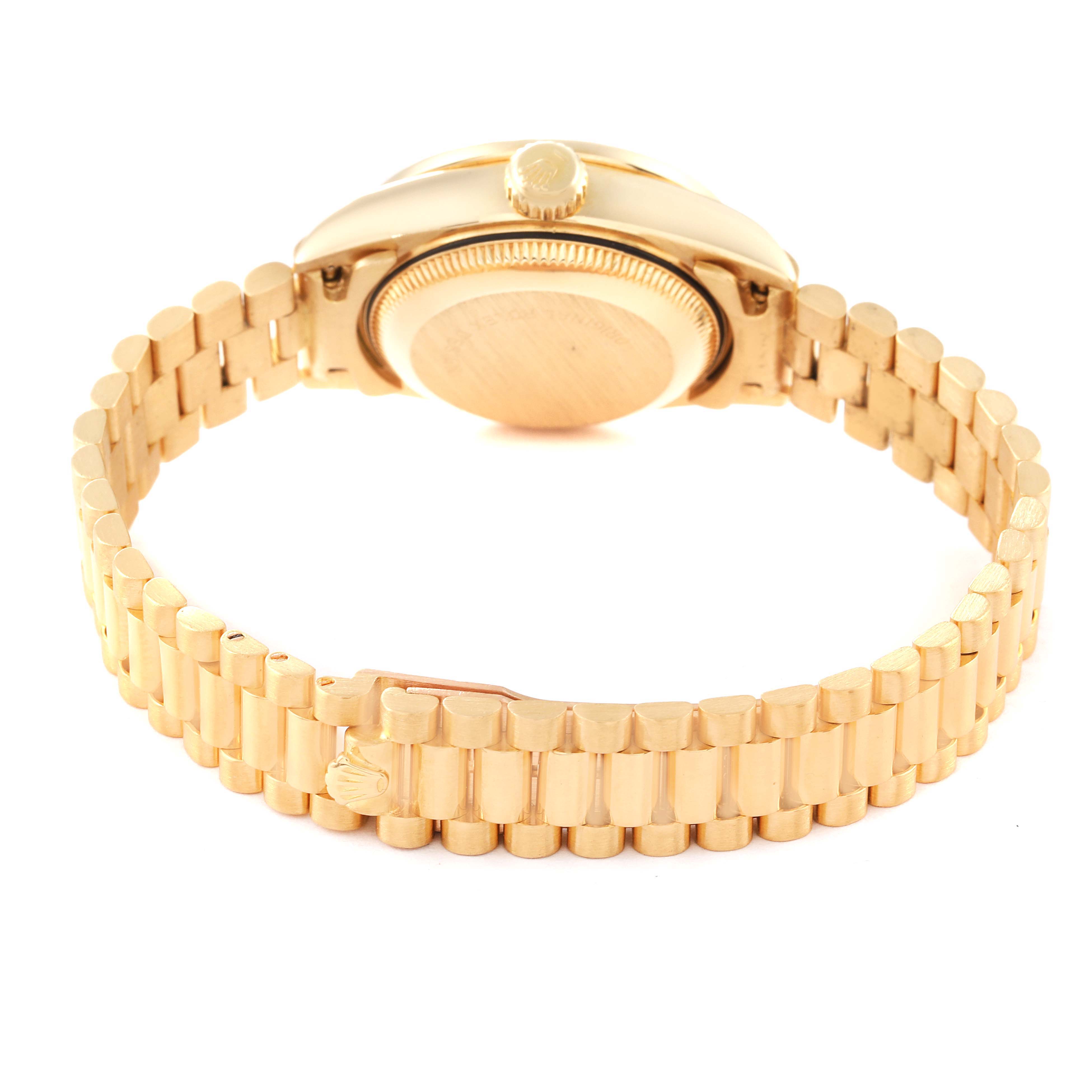 This image shows the back view of a Rolex President 69088 Women's Yellow Gold Champagne Dial 69088 Women's Yellow Gold Champagne Dial model watch, highlighting the case back, crown, and bracelet.