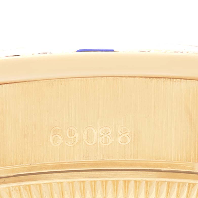 This image shows a close-up of the Rolex President 69088 Women's Yellow Gold Champagne Dial 69088 Women's Yellow Gold Champagne Dial model's case side, featuring the serial number '69088'.