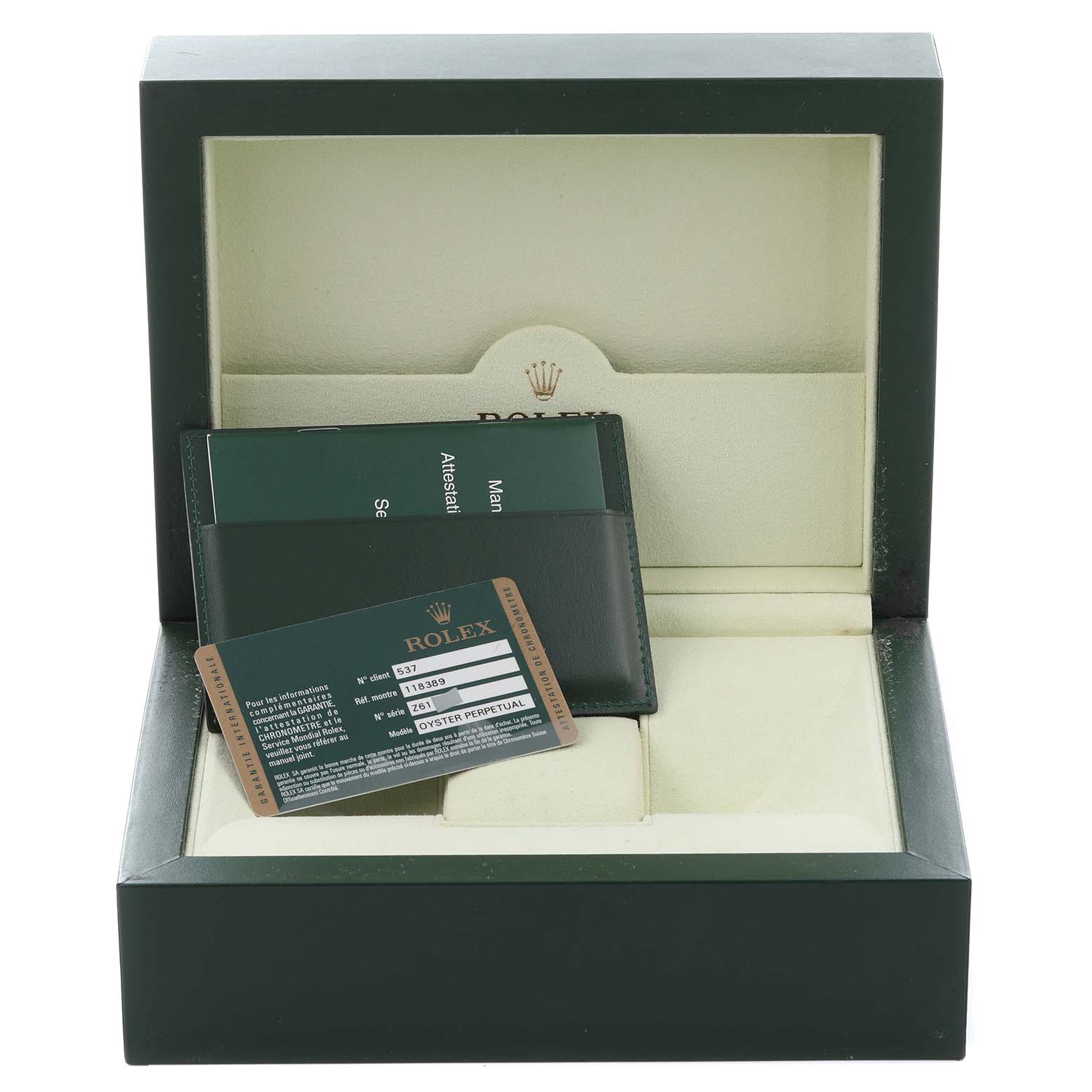 The image shows a Rolex President 118389 Men's White Gold Silver Dial 118389 Men's White Gold Silver Dial model box and accessories, including a cardholder and warranty card, inside a green case.