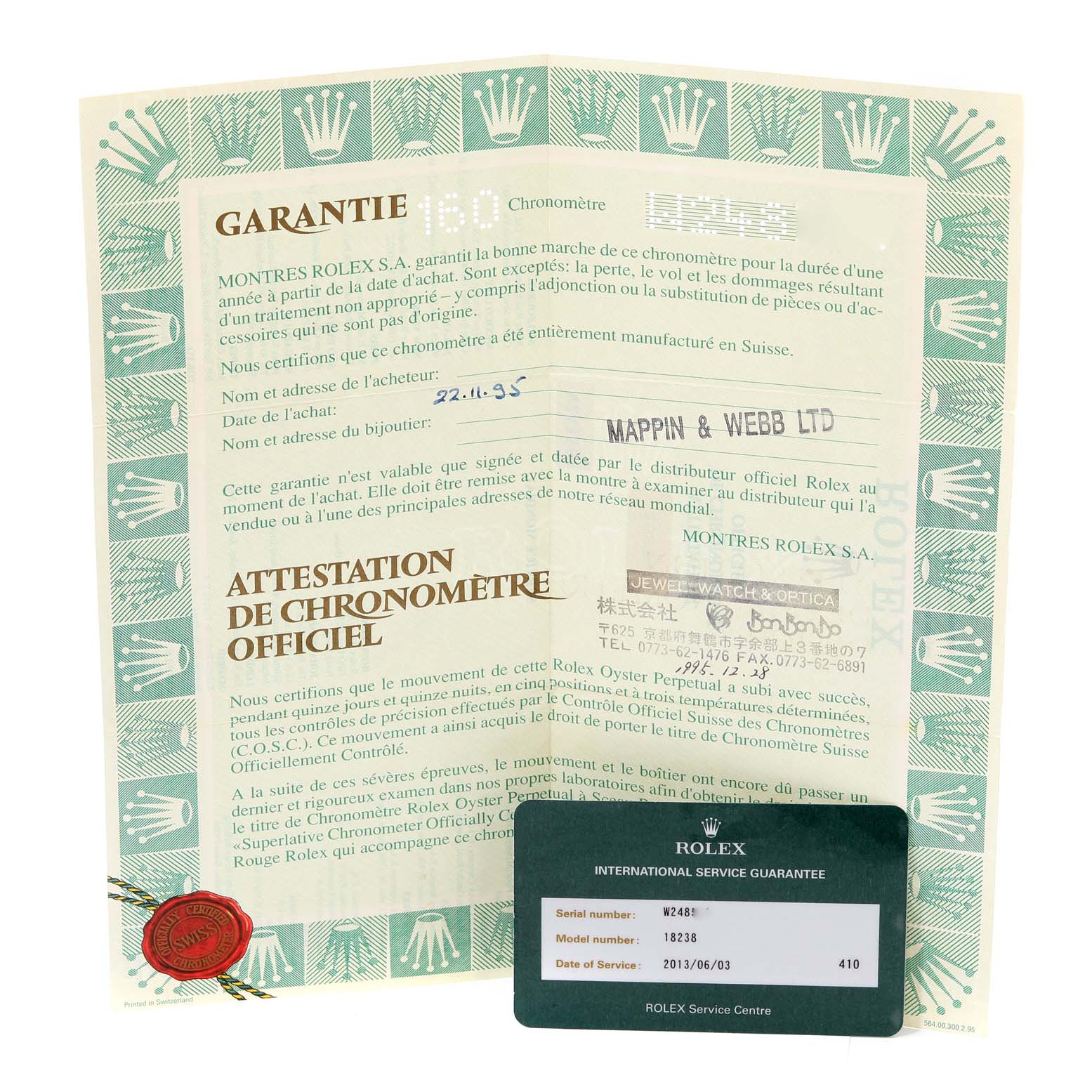 The image shows the warranty papers and International Service Guarantee card for a Rolex President 18238 Men
s Yellow Gold Champagne Dial 18238 Men
s Yellow Gold Champagne Dial model watch.