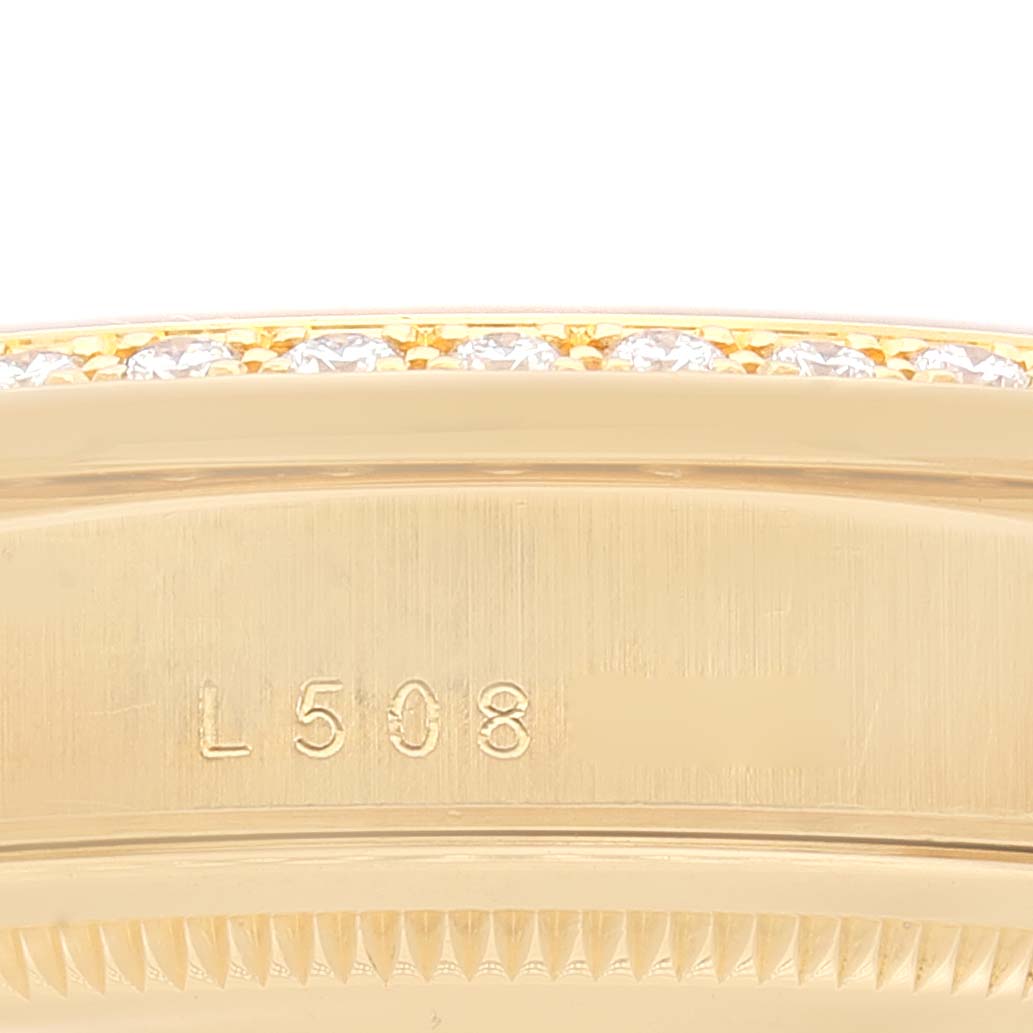 This close-up image shows a portion of the gold case and diamond-encrusted bezel of a Rolex President 18348 Men's Yellow Gold Champagne Dial 18348 Men's Yellow Gold Champagne Dial watch model.