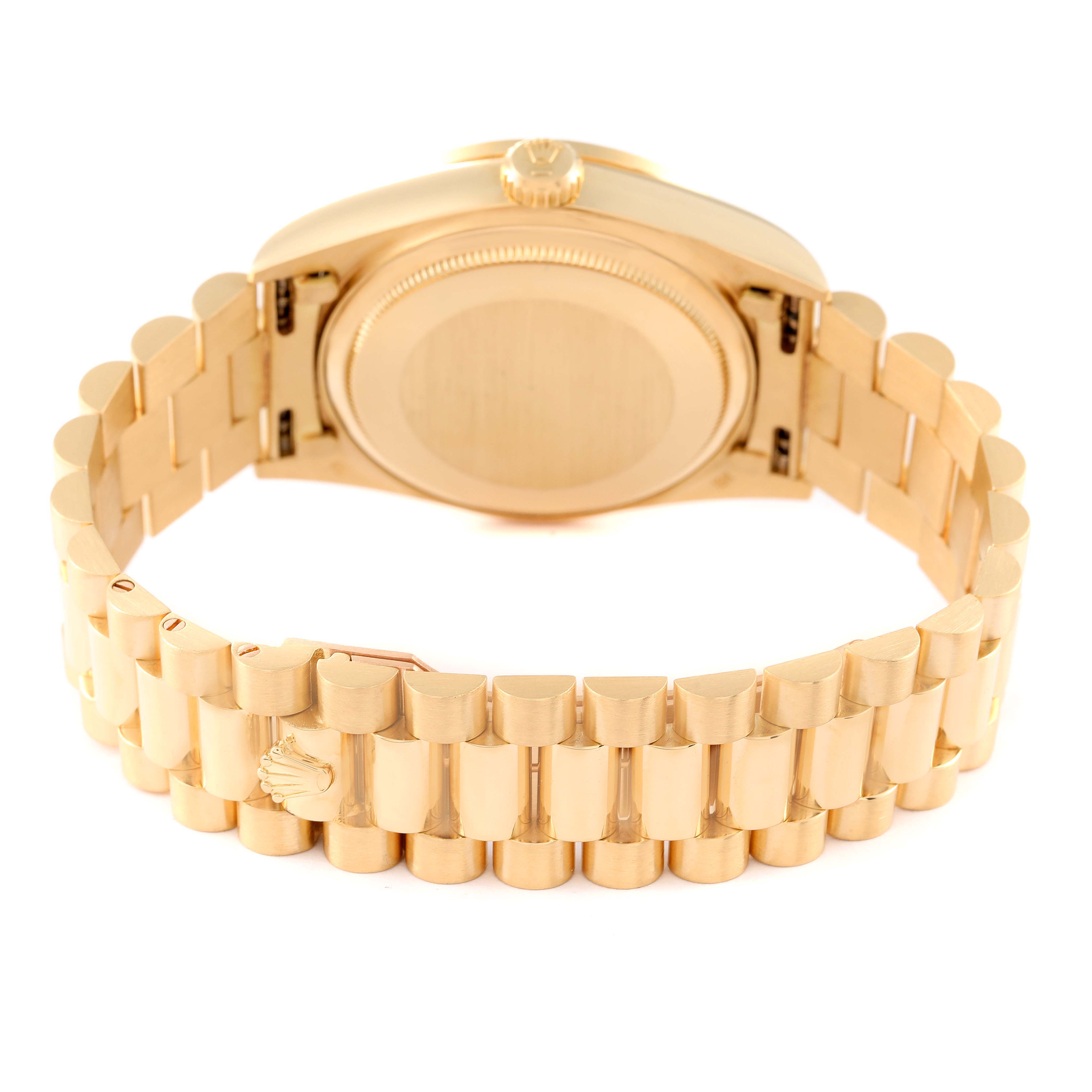 The image shows the back and strap of a Rolex President 18048 Men
s Yellow Gold Champagne Dial 18048 Men
s Yellow Gold Champagne Dial model watch at an angle highlighting the case and bracelet.