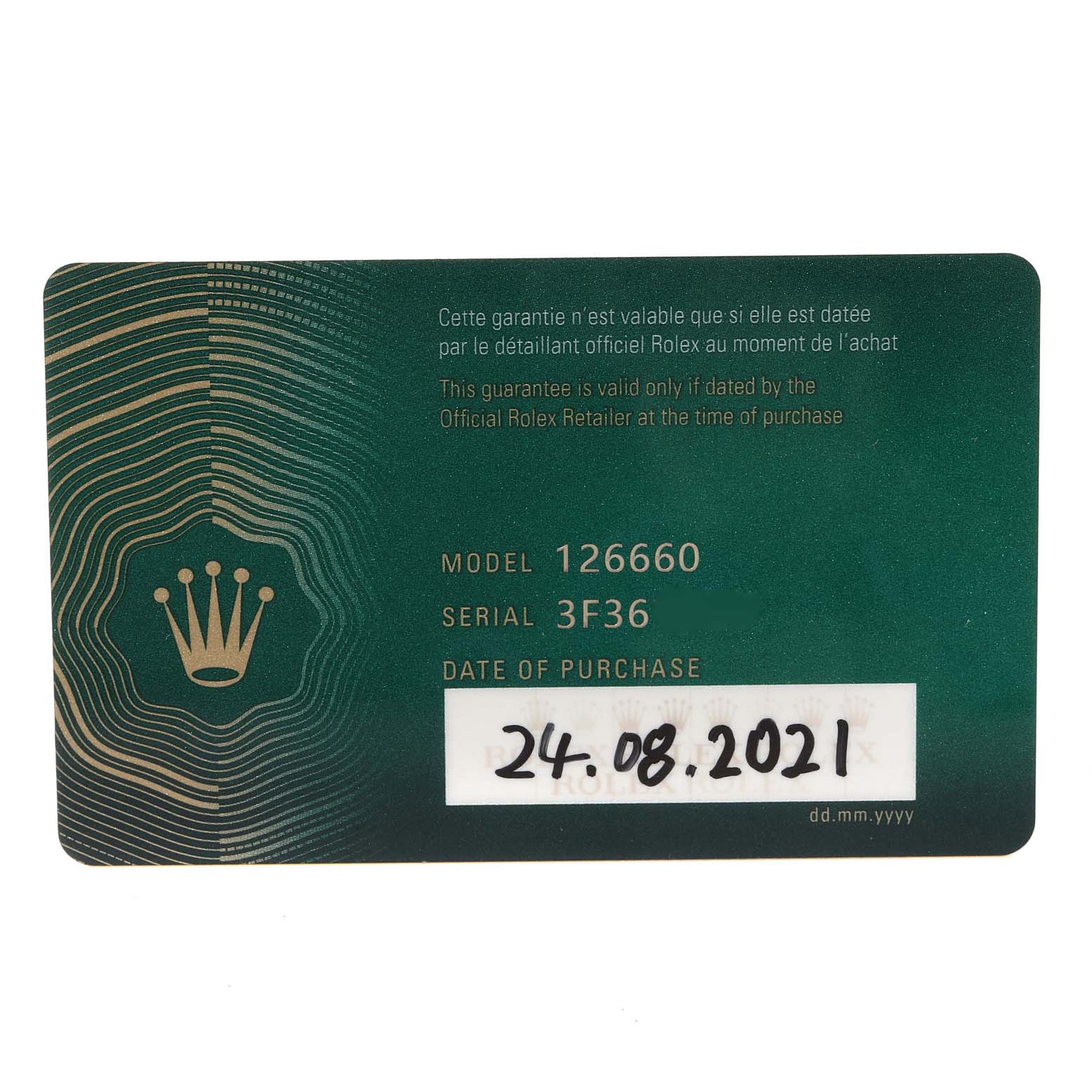 This image shows the warranty card for the Rolex Sea-Dweller 126660 Men
s Stainless Steel Blue Dial 126660 Men
s Stainless Steel Blue Dial model 126660, displaying the serial number and date of purchase.