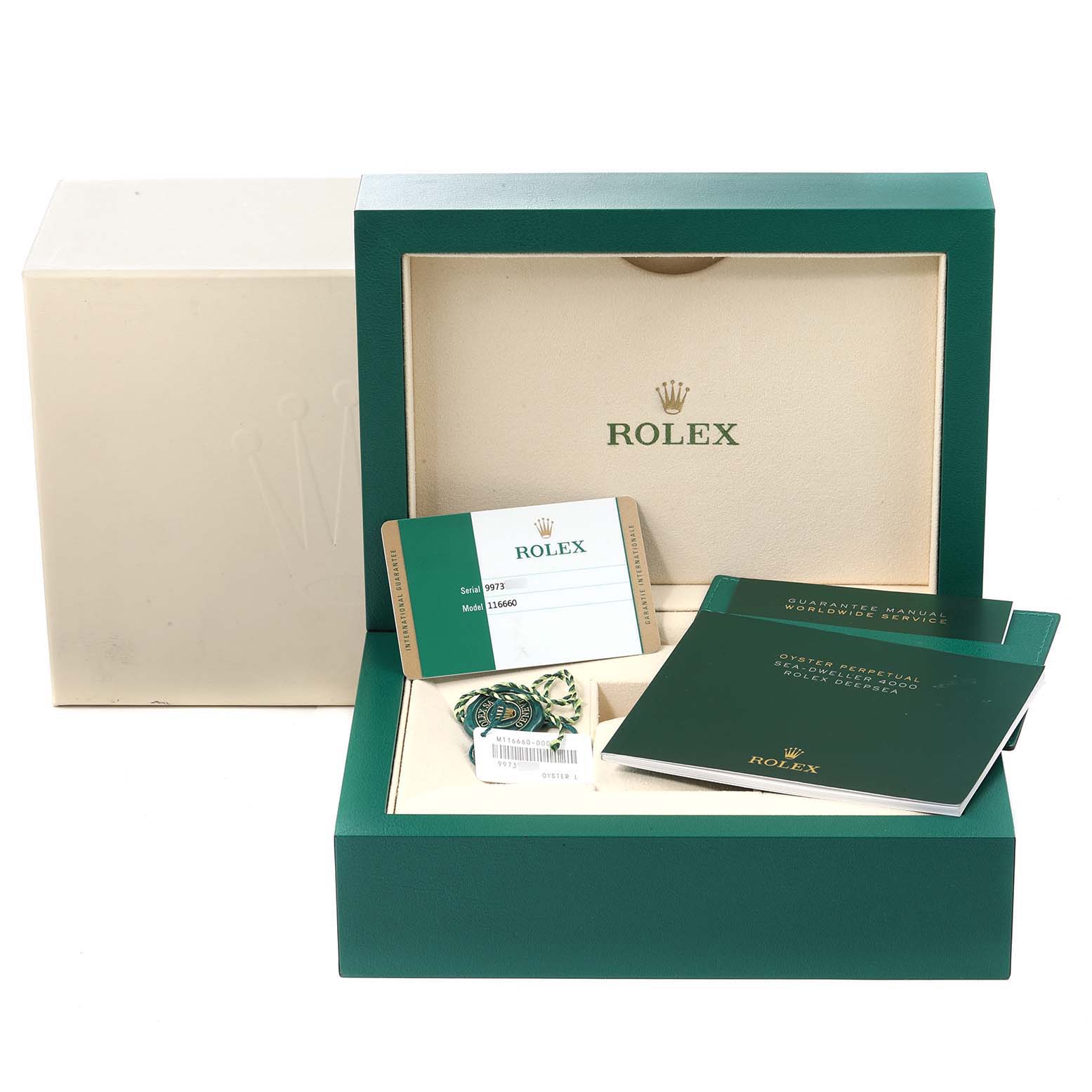 The image shows the packaging and accessories, including the manual and warranty card, for the Rolex Sea-Dweller 116660 Men's Stainless Steel Blue Dial 116660 Men's Stainless Steel Blue Dial watch.