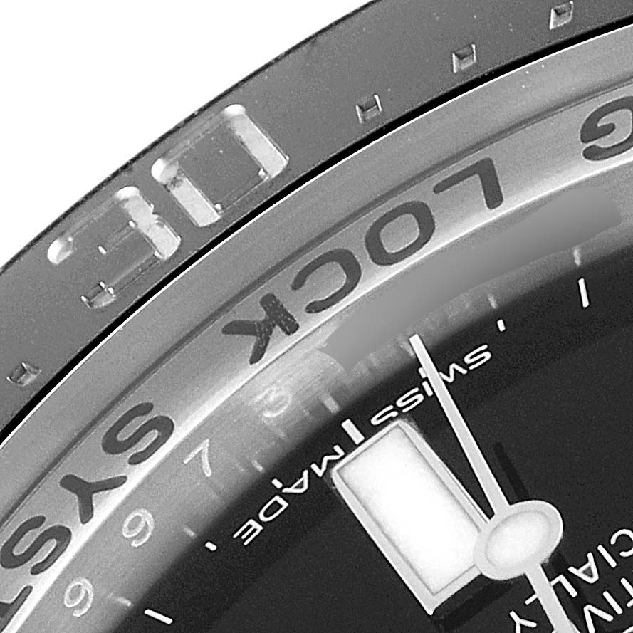 The image shows a close-up of the bezel and dial of a Rolex Sea-Dweller 116660 Men's Stainless Steel Blue Dial 116660 Men's Stainless Steel Blue Dial watch, highlighting the "LOCK" text and part of the minute hand.
