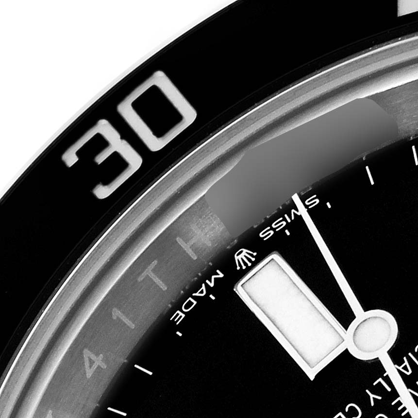 The image shows a close-up of the watch face and bezel of the Rolex Submariner 126610 Men
s Stainless Steel Black Dial 126610 Men
s Stainless Steel Black Dial, highlighting the minute hand and the "30" marker.