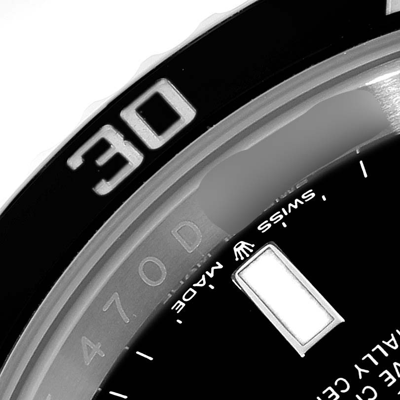 The image shows a close-up of the bezel and a part of the dial of a Rolex Submariner 126610 Men
s Stainless Steel Black Dial 126610 Men
s Stainless Steel Black Dial watch.