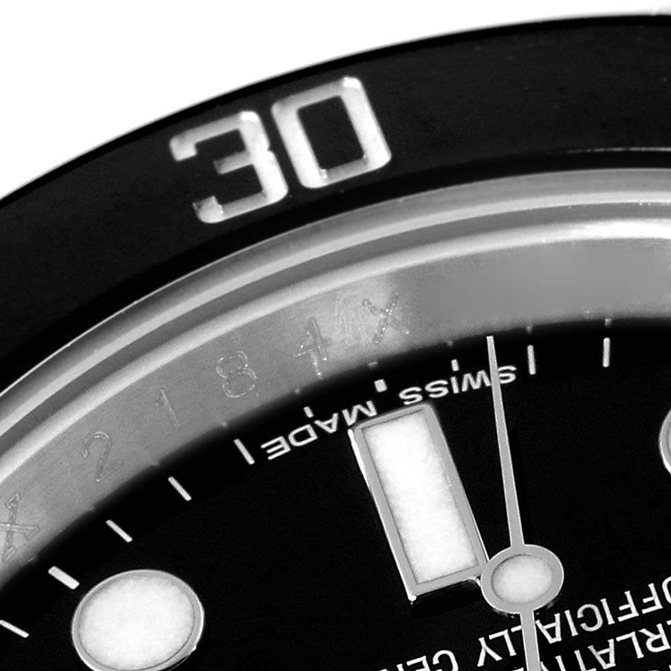 The image shows a close-up of the bezel, dial, and hands of a Rolex Submariner 116610 Men
s Stainless Steel Black Dial 116610 Men
s Stainless Steel Black Dial watch.