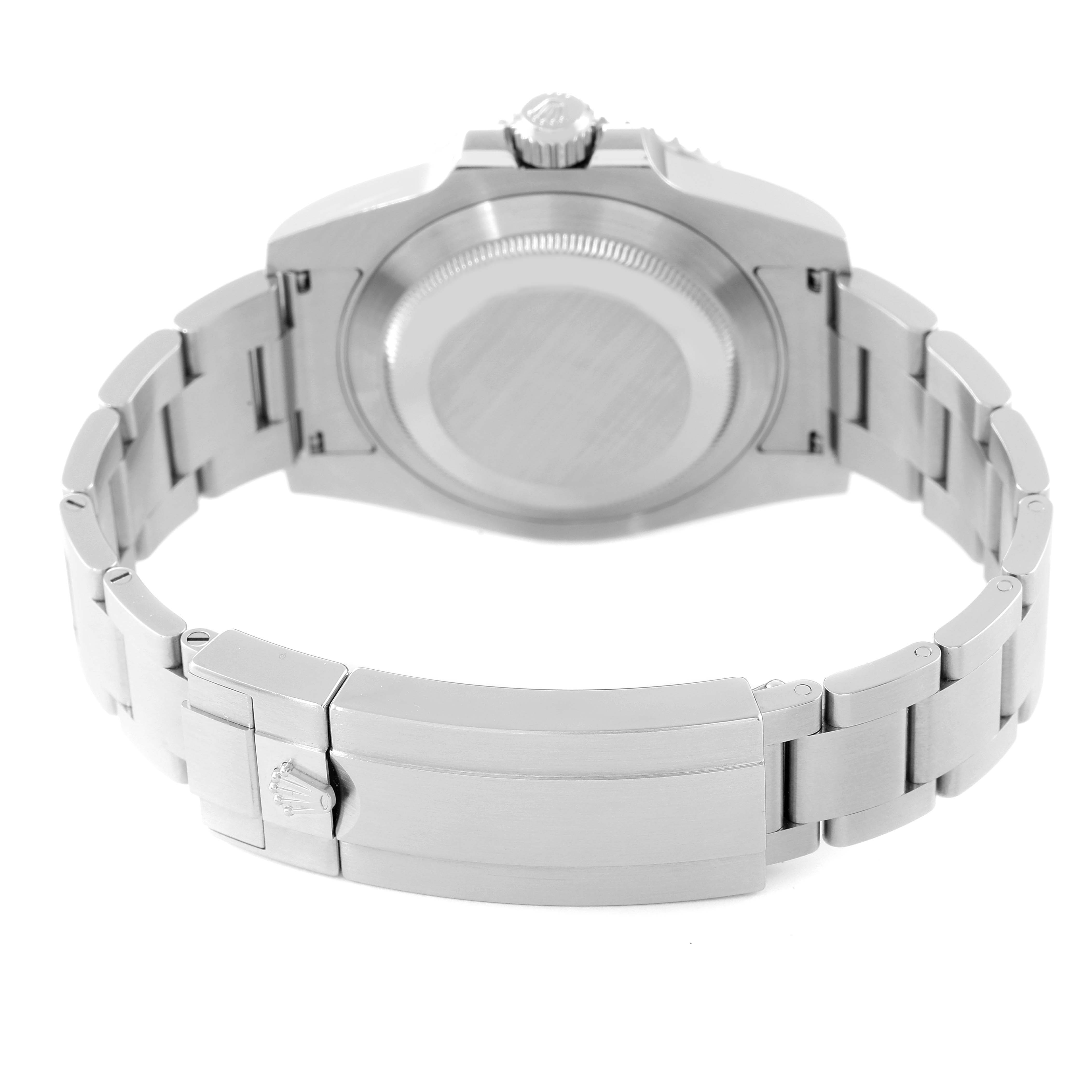 The image shows the back view and clasp of a Rolex Submariner 116610LV Men's Stainless Steel Green Dial 116610LV Men's Stainless Steel Green Dial watch, focusing on the stainless steel bracelet and case back.