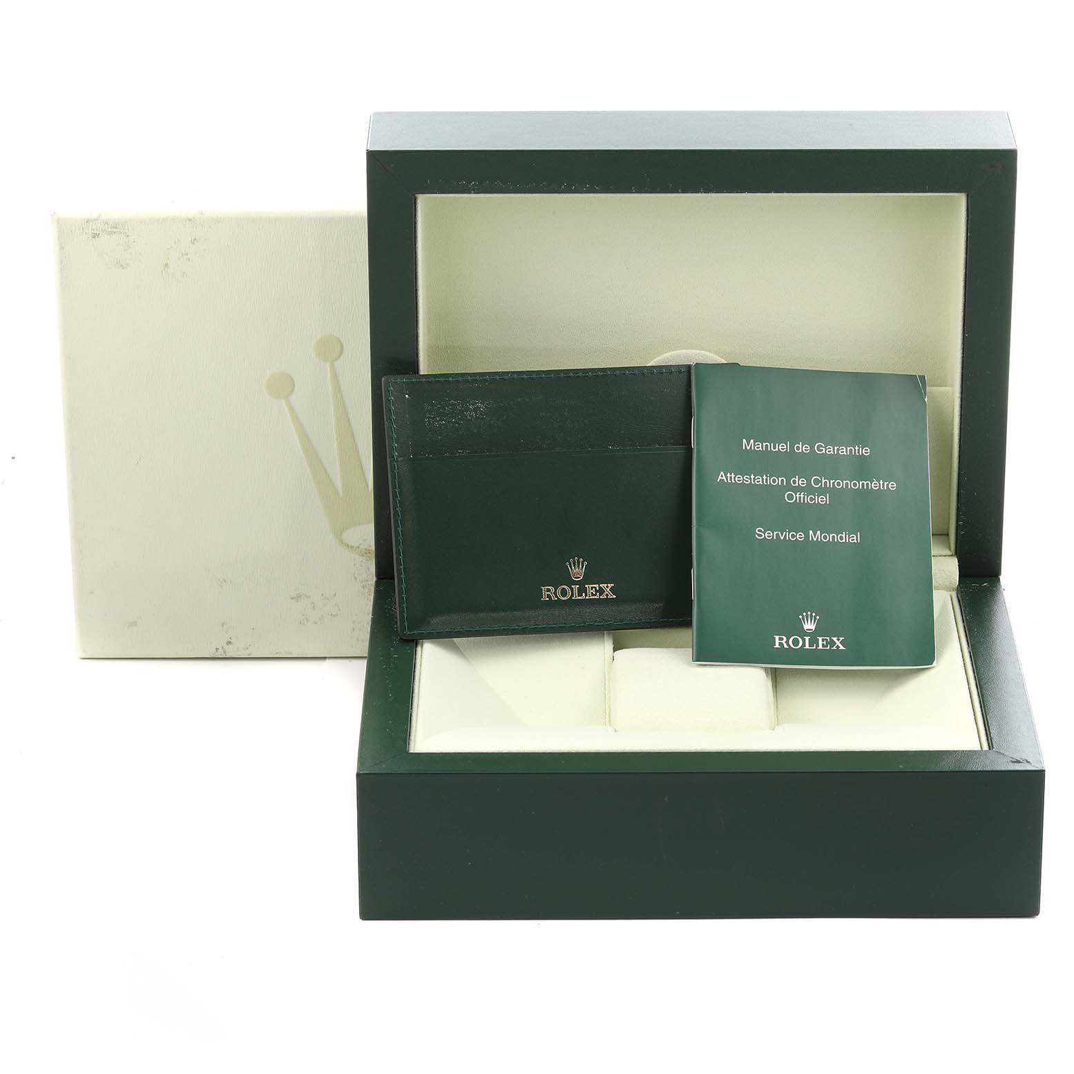 The image shows the packaging and accessories of a Rolex Submariner 116610LV Men
s Stainless Steel Green Dial 116610LV Men
s Stainless Steel Green Dial, including the box, warranty manual, and cardholder.