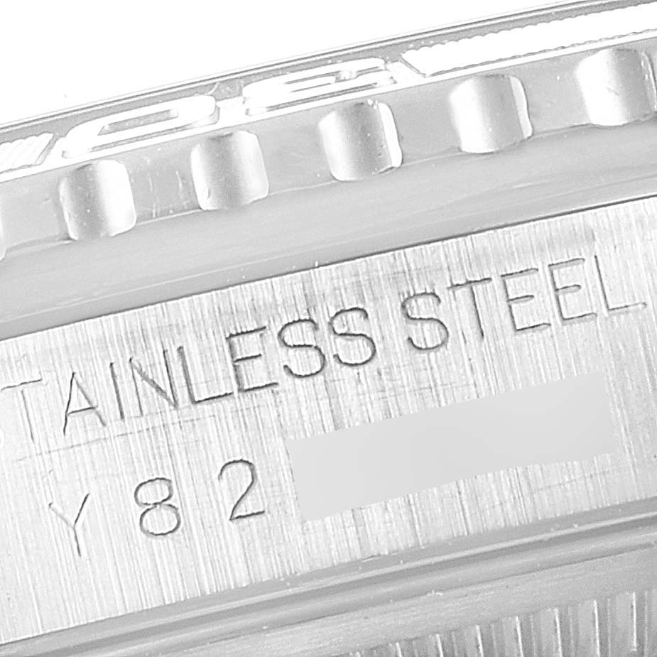 The image shows a close-up of the side markings on the bezel and caseback of a Rolex Turn-o-Graph 16264 Men
s Stainless Steel Silver Dial 16264 Men
s Stainless Steel Silver Dial watch.