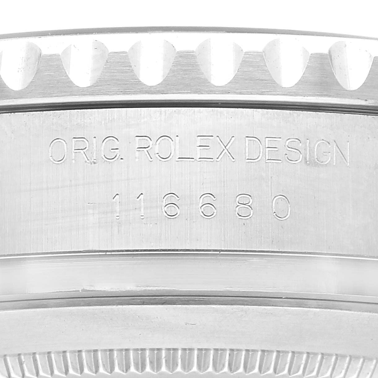 This image shows a close-up of the side of a Rolex Yacht-Master 116680 Men's Stainless Steel White Dial 116680 Men's Stainless Steel White Dial watch, highlighting the "ORIG. ROLEX DESIGN 116680" engraving.