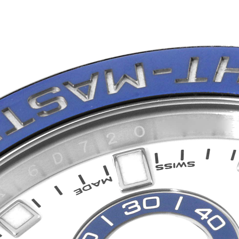 This image shows a close-up of the bezel and a portion of the dial of a Rolex Yacht-Master 116680 Men's Stainless Steel White Dial 116680 Men's Stainless Steel White Dial watch.