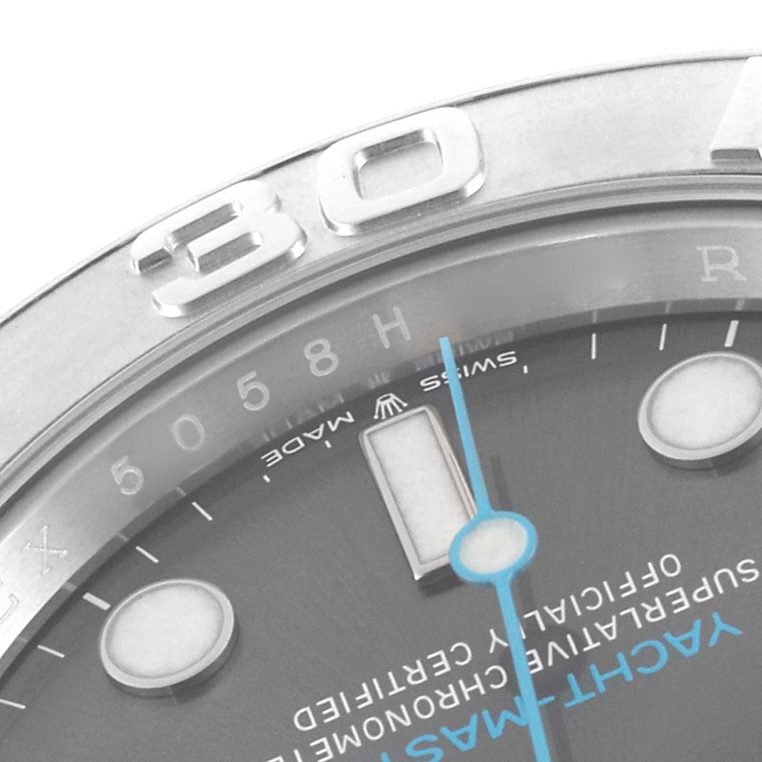 The Rolex Yacht-Master 126622 Men's Stainless Steel Grey Dial 126622 Men's Stainless Steel Grey Dial watch is shown close-up, displaying its bezel, dial, and part of the hand with markers.