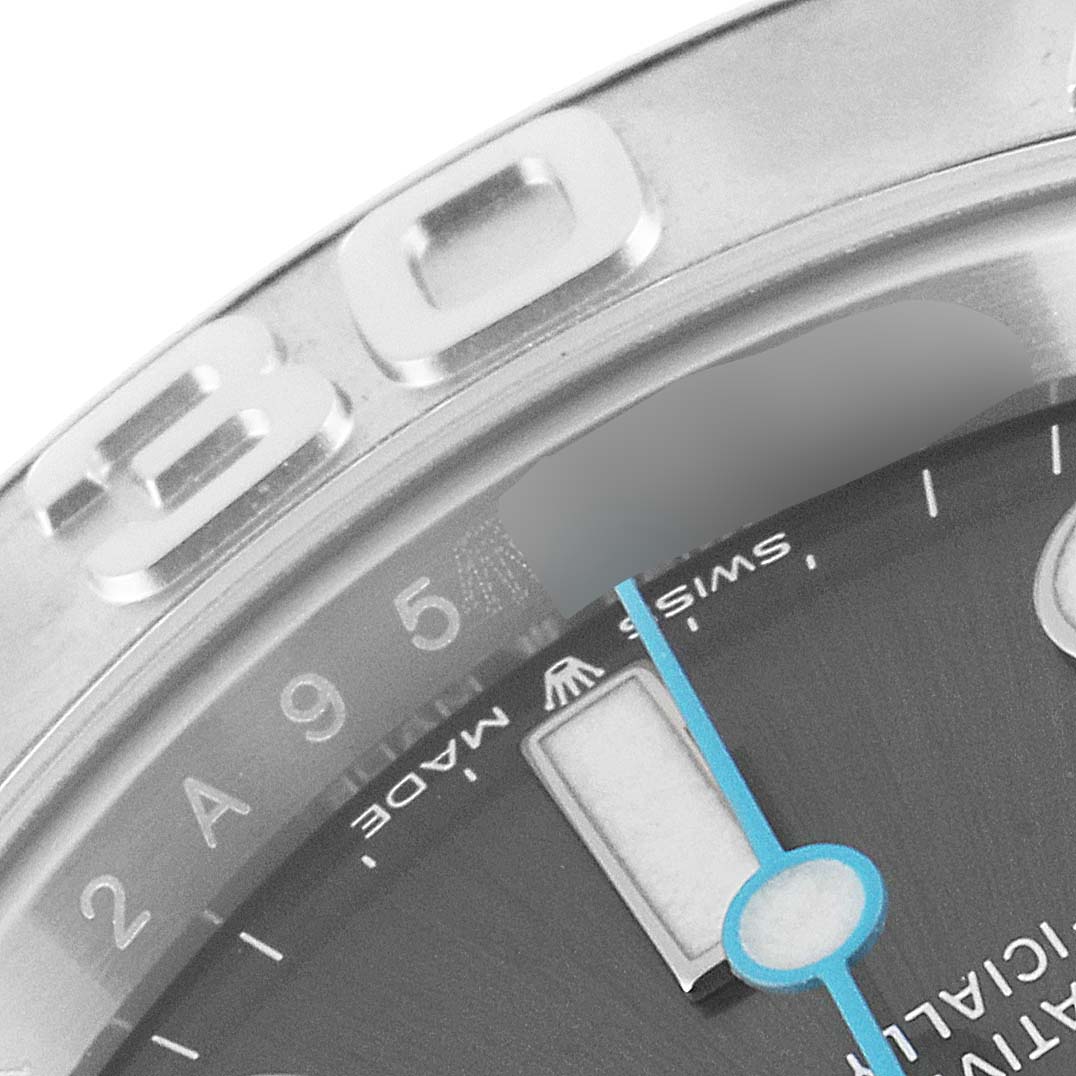 This close-up image of the Rolex Yacht-Master 126622 Men's Stainless Steel Grey Dial 126622 Men's Stainless Steel Grey Dial watch shows part of the bezel and the upper section of the dial, including the hour markers and hands.