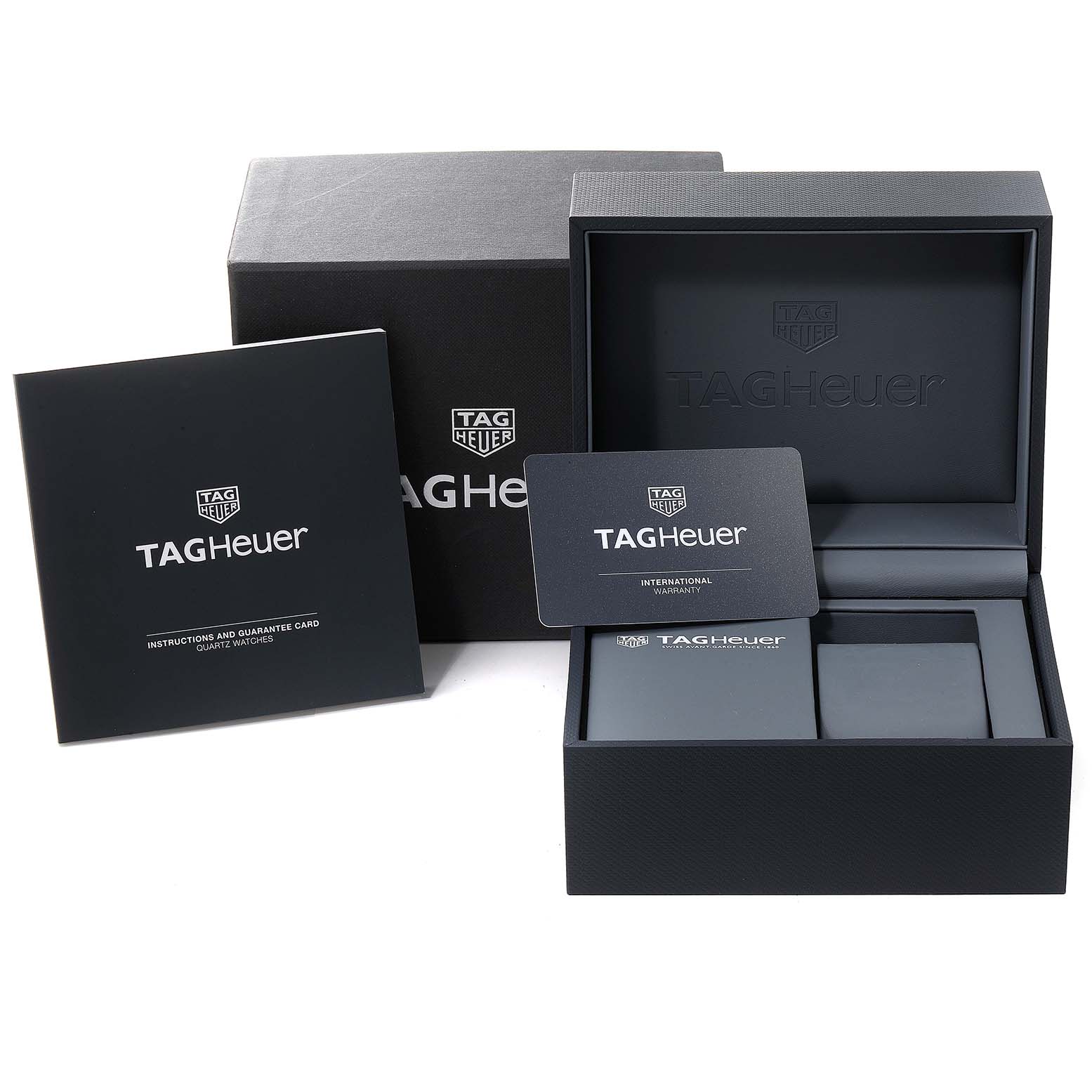 The image displays watch accessories for the Tag Heuer Carrera WBG1351.FC6418 Women's Steel and Gold (two tone) Black Dial WBG1351.FC6418 Women's Steel and Gold (two tone) Black Dial model, including the box, instruction manual, and warranty card.