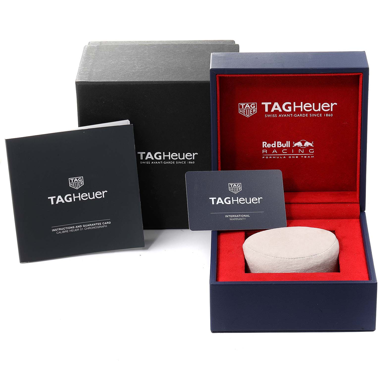 The image shows the Tag Heuer Carrera CAR2A1N.FT6100 Men's Stainless Steel Blue Dial CAR2A1N.FT6100 Men's Stainless Steel Blue Dial model packaging including the outer box, inner box, instruction manual, and warranty card.