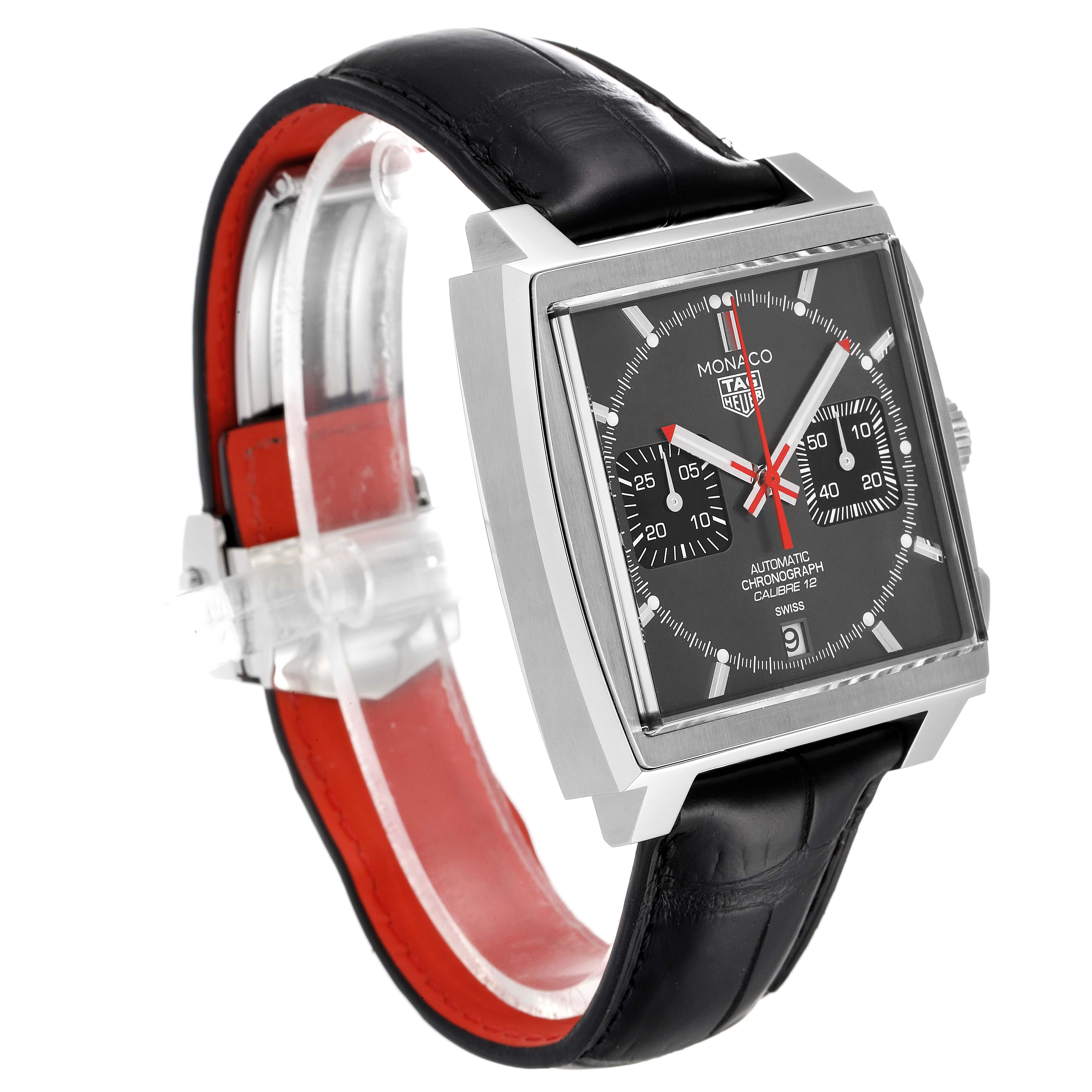The Tag Heuer Monaco watch is shown from a 3/4 angle, displaying the face, case, and leather strap.