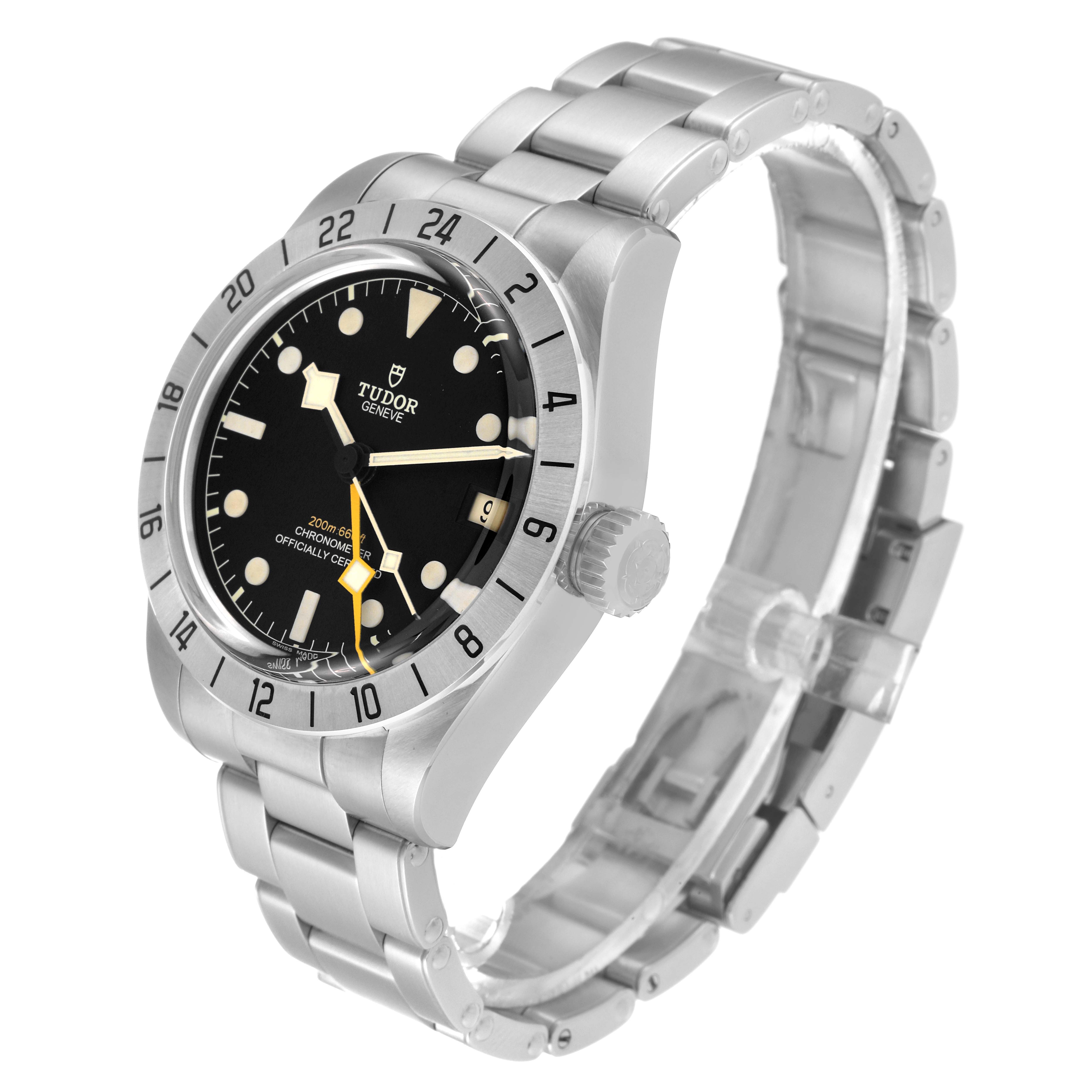 The image shows a Tudor Heritage Black Bay M79470-0003 Men
s Stainless Steel Black Dial M79470-0003 Men
s Stainless Steel Black Dial watch from a front-left angle, highlighting the watch face, bezel, crown, and stainless steel bracelet.