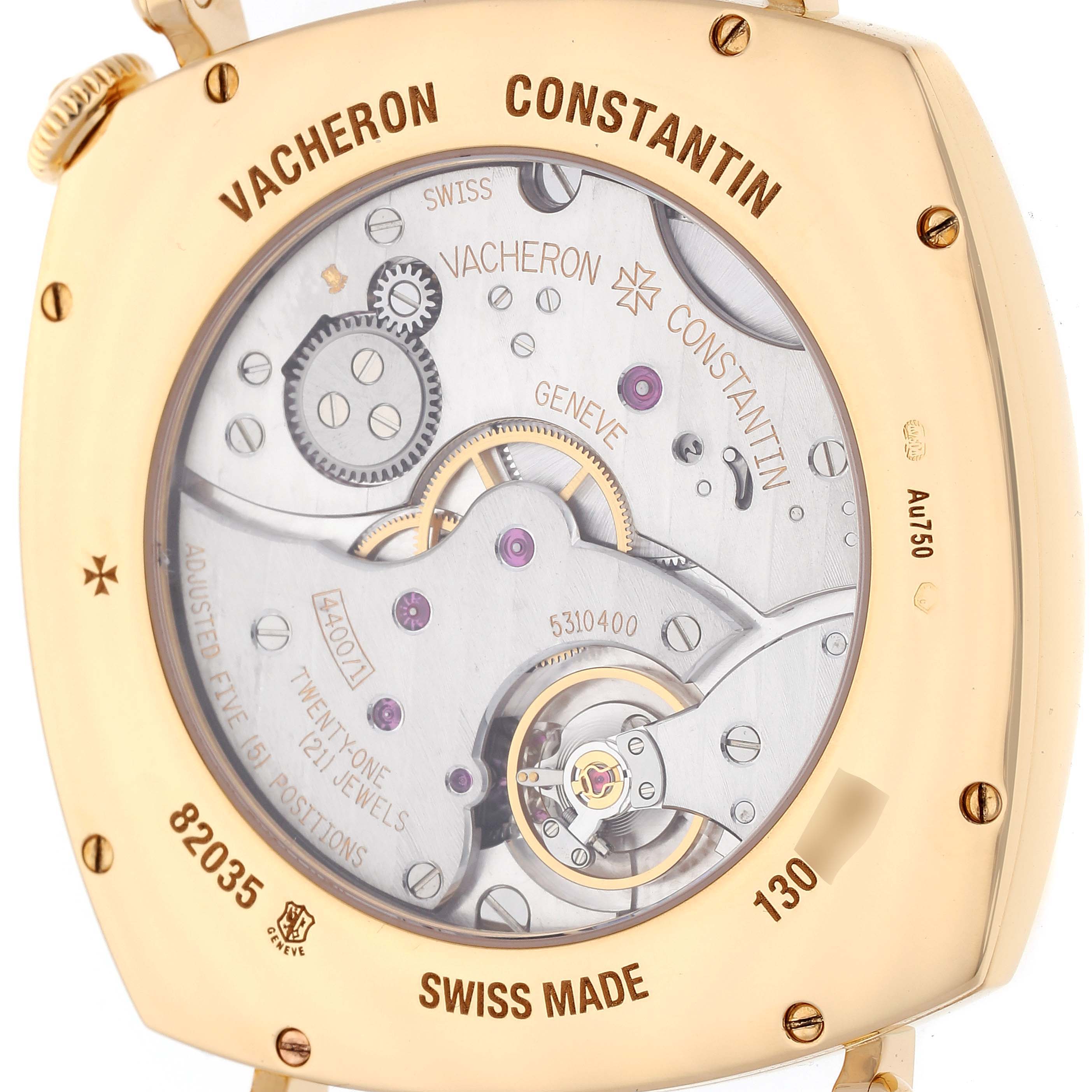 The image shows the back view of a Vacheron Constantin Historiques 82035/000J-9964 Men's Yellow Gold Silver Dial 82035/000J-9964 Men's Yellow Gold Silver Dial model, revealing its intricate mechanical movement.