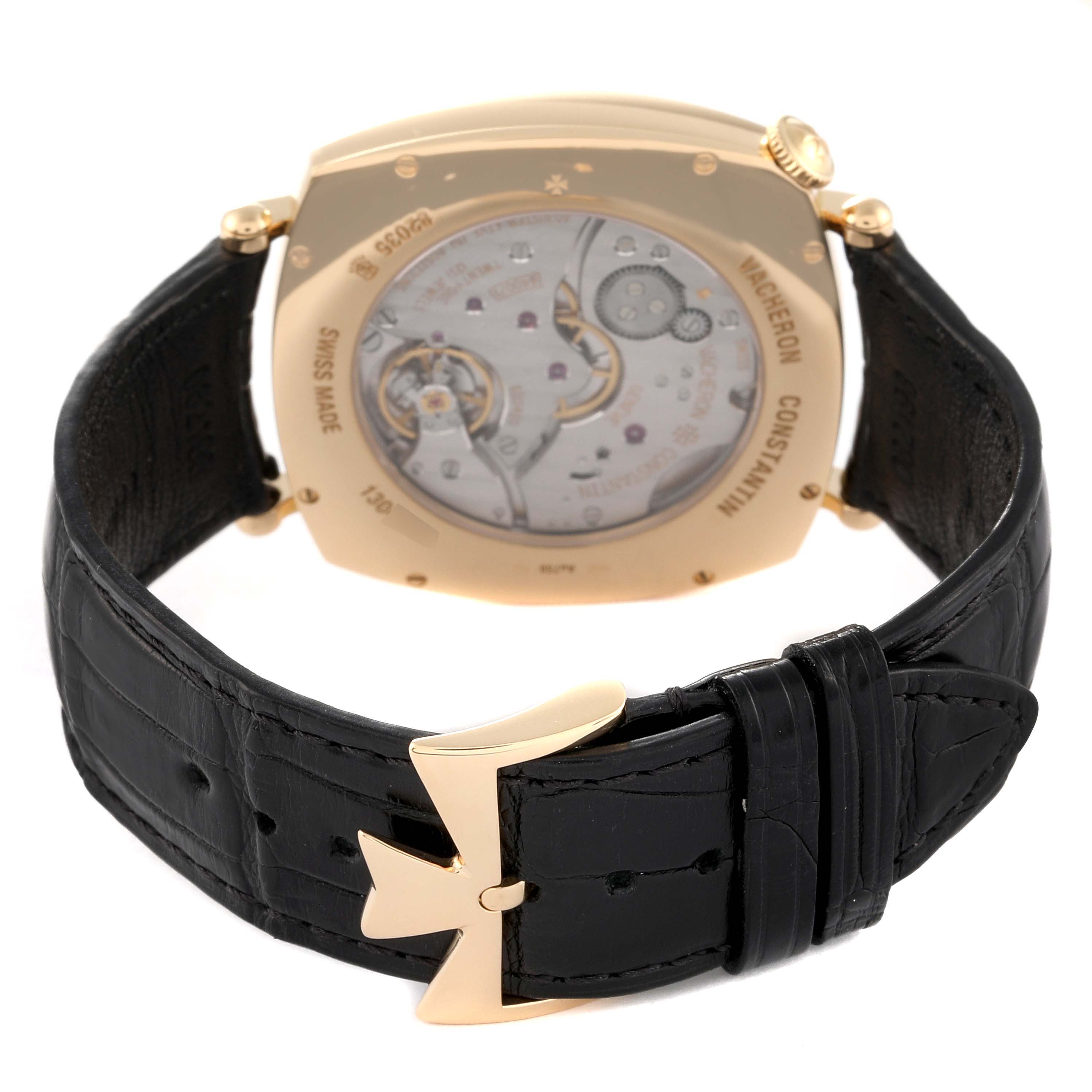 The image shows the back view of a Vacheron Constantin Historiques 82035/000J-9964 Men's Yellow Gold Silver Dial 82035/000J-9964 Men's Yellow Gold Silver Dial watch, highlighting the case back and black leather strap.